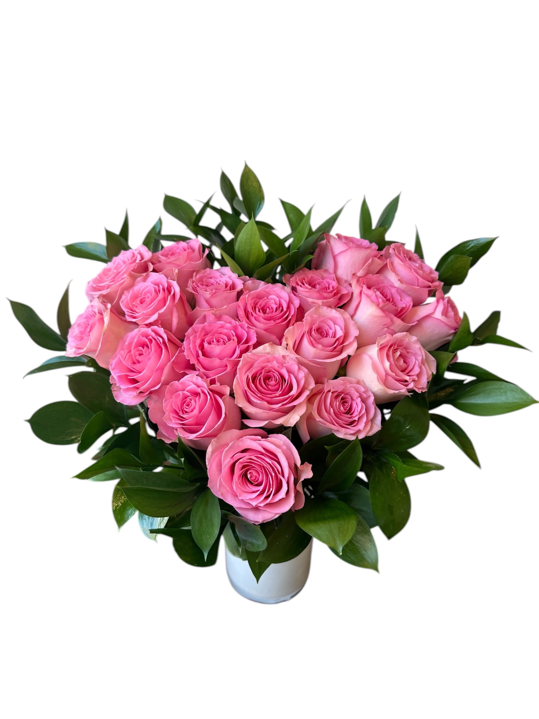 Pink Heart Shaped Rose's  - 19 light pink roses designed in a heart shape with greens in a white glass vase. As shown in photo.