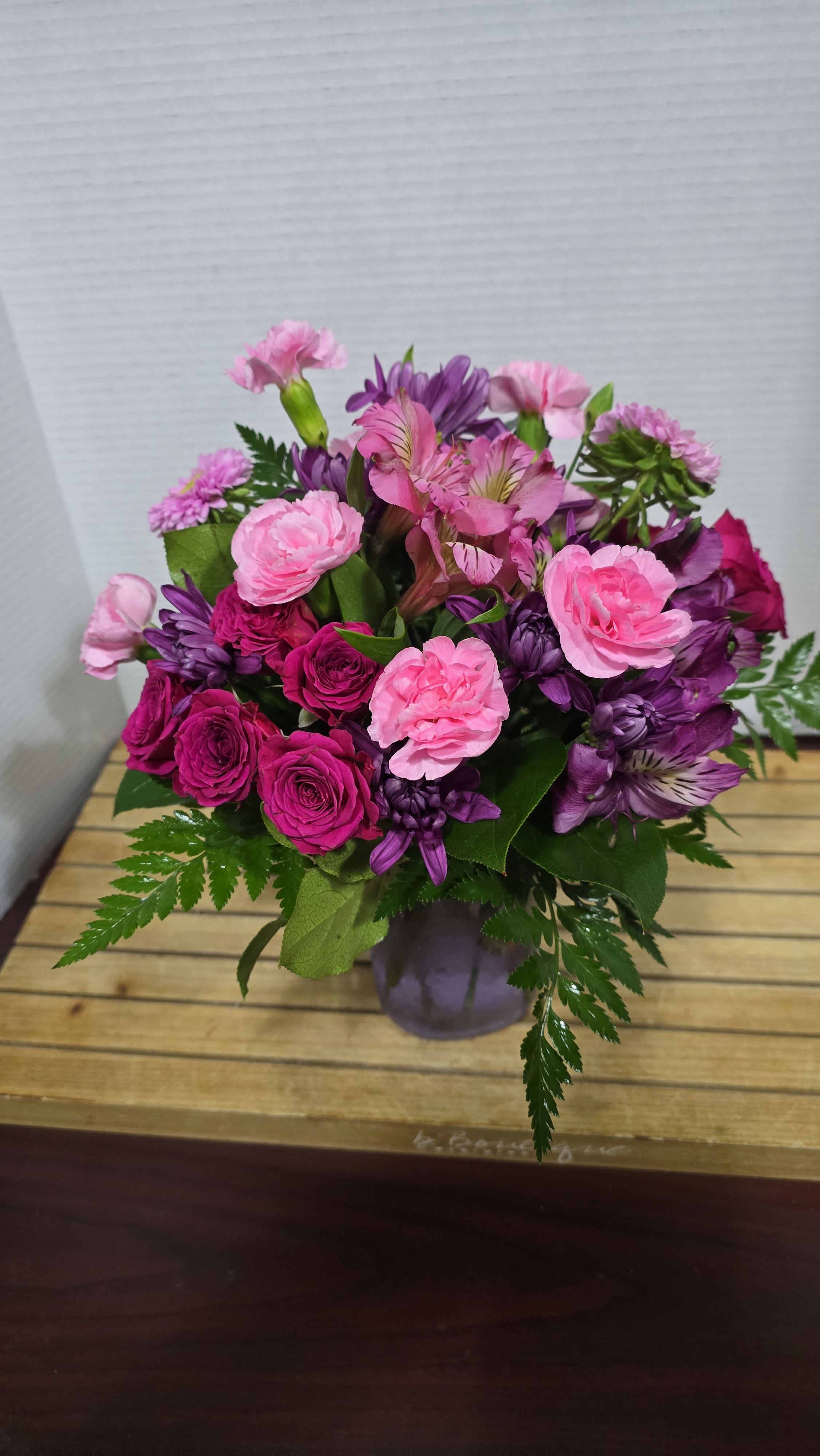 Pink and purple mixed bouquet in a vase
