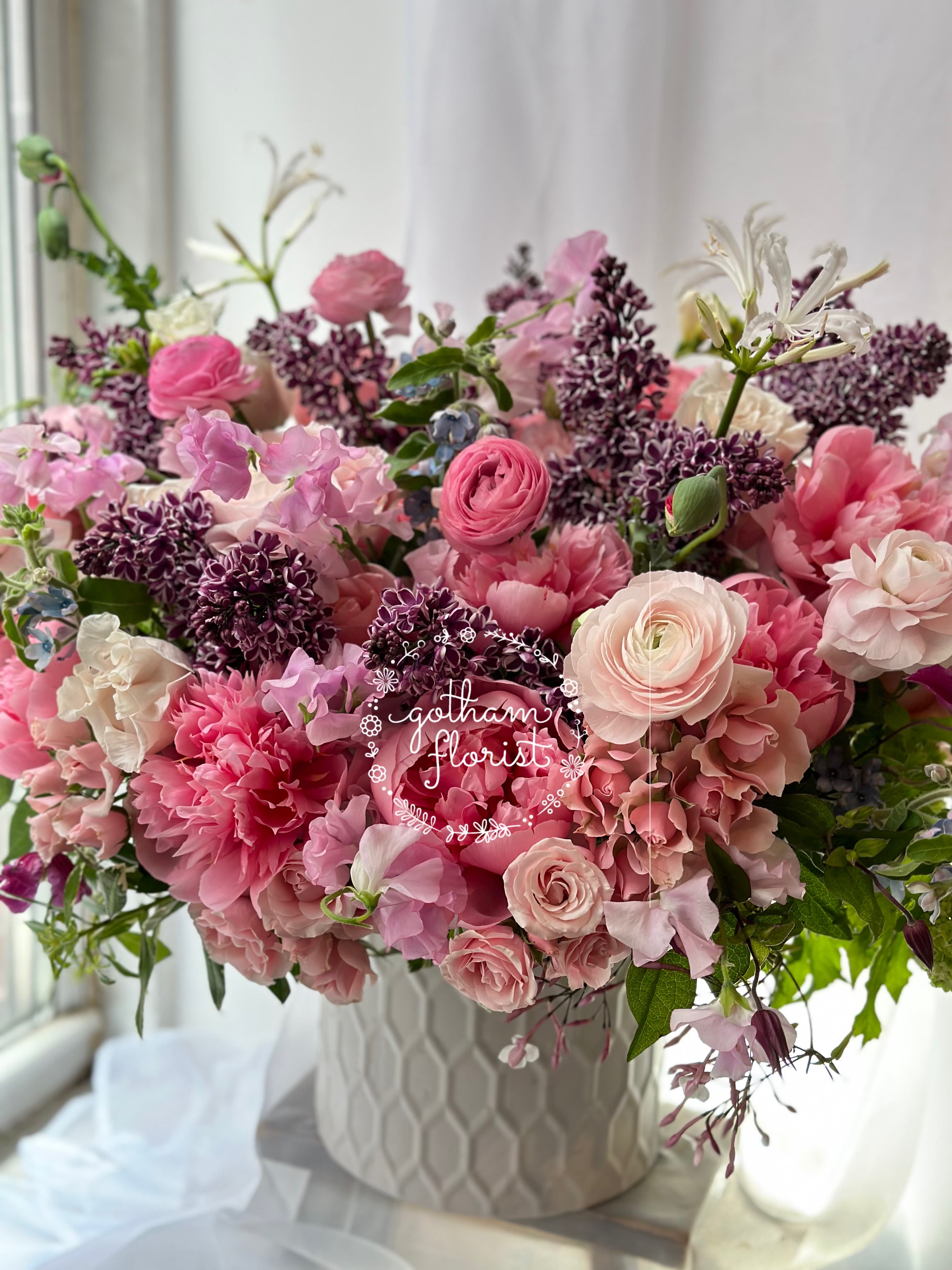 Beauty Queen - Beautiful silver urn vase with luxurious blooms.