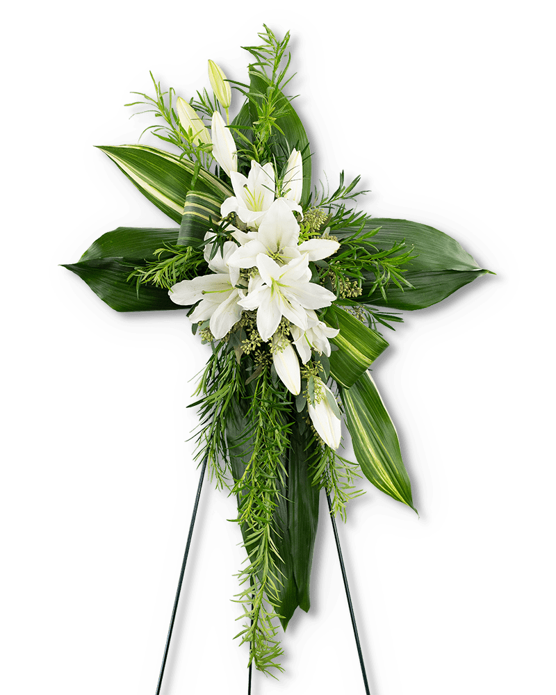 Cross of Comfort - Our Cross of Comfort standing spray is the perfect symbol of a loved one’s faith filled life on earth. A variety of textures in premium foliage combine with white oriental lilies to make a stunning and organic cross, made to be displayed near the casket or urn. White flowers are commonly used in sympathy designs, because they convey purity, peace, and love. Sympathy flowers are the perfect way to honor a life or send your condolences to the grieving family.