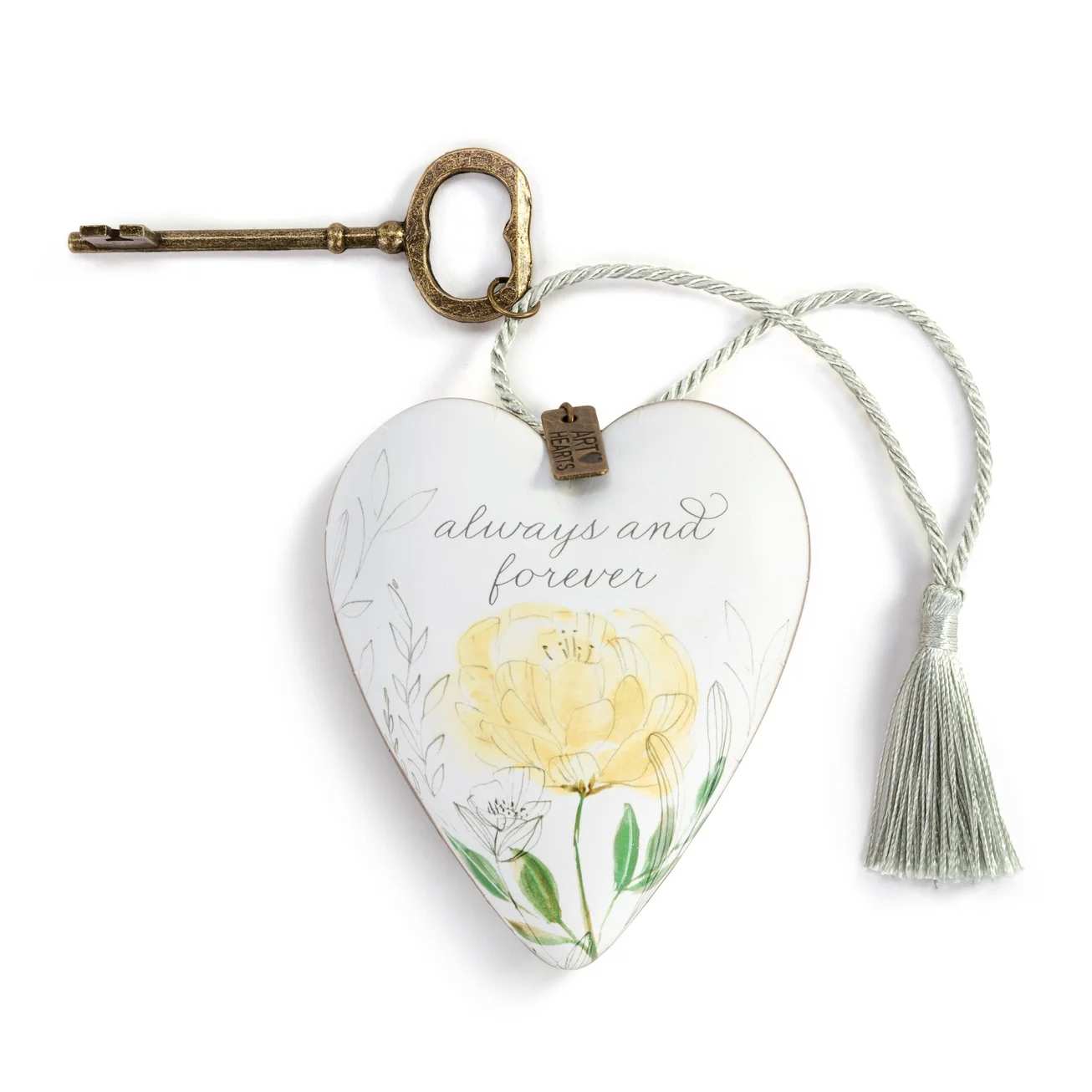 Heart-shaped hanging ornament with a key and tassel