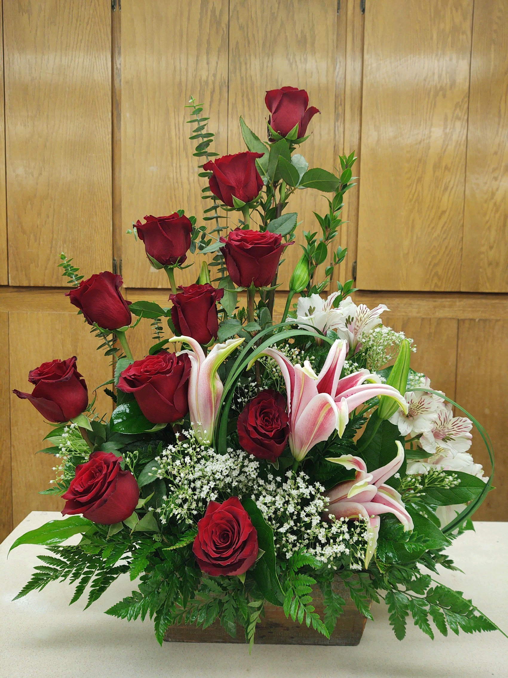 Mi Amor - Deep red roses, fragrant stargazer lilies and beautiful alstromeria blooms come together to show your love. Mi Amor checks all the boxes.  