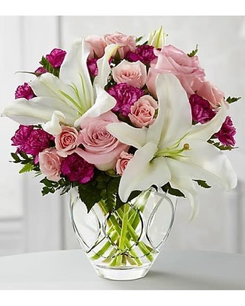 The Perfect Day - The Perfect Day extends warmth and sunlit cheer through the beauty of roses and Oriental lilies to wish your special recipient a day like none other! Pink roses, white Oriental lilies, pale pink spray roses, plum mini carnations and lush greens are brought together in a designer etched clear glass vase to create an incredible flower arrangement intended to make them feel special and loved. This stunning flower bouquet is the perfect gift for Mother's Day, to say happy birthday or anniversary, or to extend your get well wishes. 