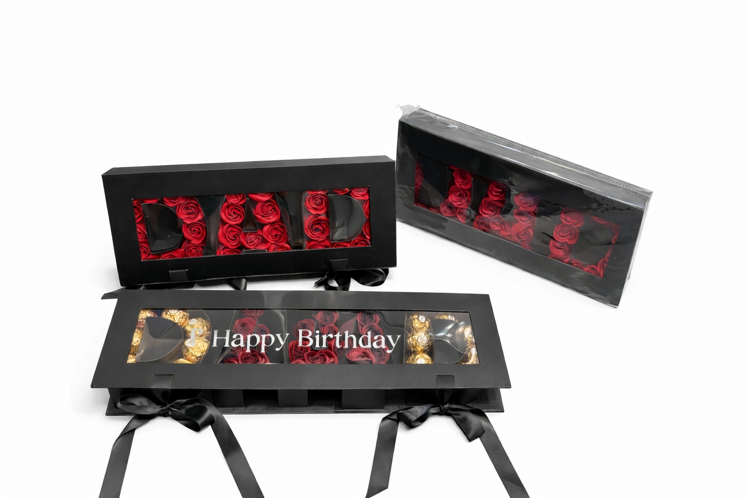 Dad Luxury Box - Elegante caja diseñado para papá con un sofisticado acabado negro y una cobinacion única de rosas artificiales y chocolates premium tipo ferrero. Su diseño moderno con ventana transparente permite apreciar cada detalle ,creando un regalo impactante y lleno de estilo.
