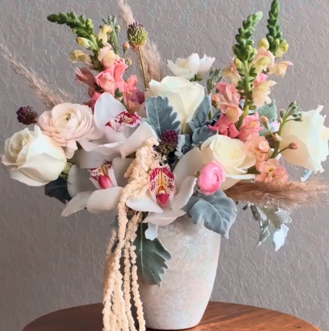 Luxury Orchid &amp; Garden Roses Arrangement – San Antonio Same Day Delivery - Luxury pastel flower arrangement in San Antonio by Snyder Flowers featuring fresh orchids, garden roses, ranunculus, snapdragons, lisianthus, pampas grass and premium greenery designed in a modern ceramic vase perfect for Mother’s Day, weddings, anniversaries and elegant gifts with same day flower delivery in San Antonio, high quality fresh flowers and affordable prices for a sophisticated and unique floral design