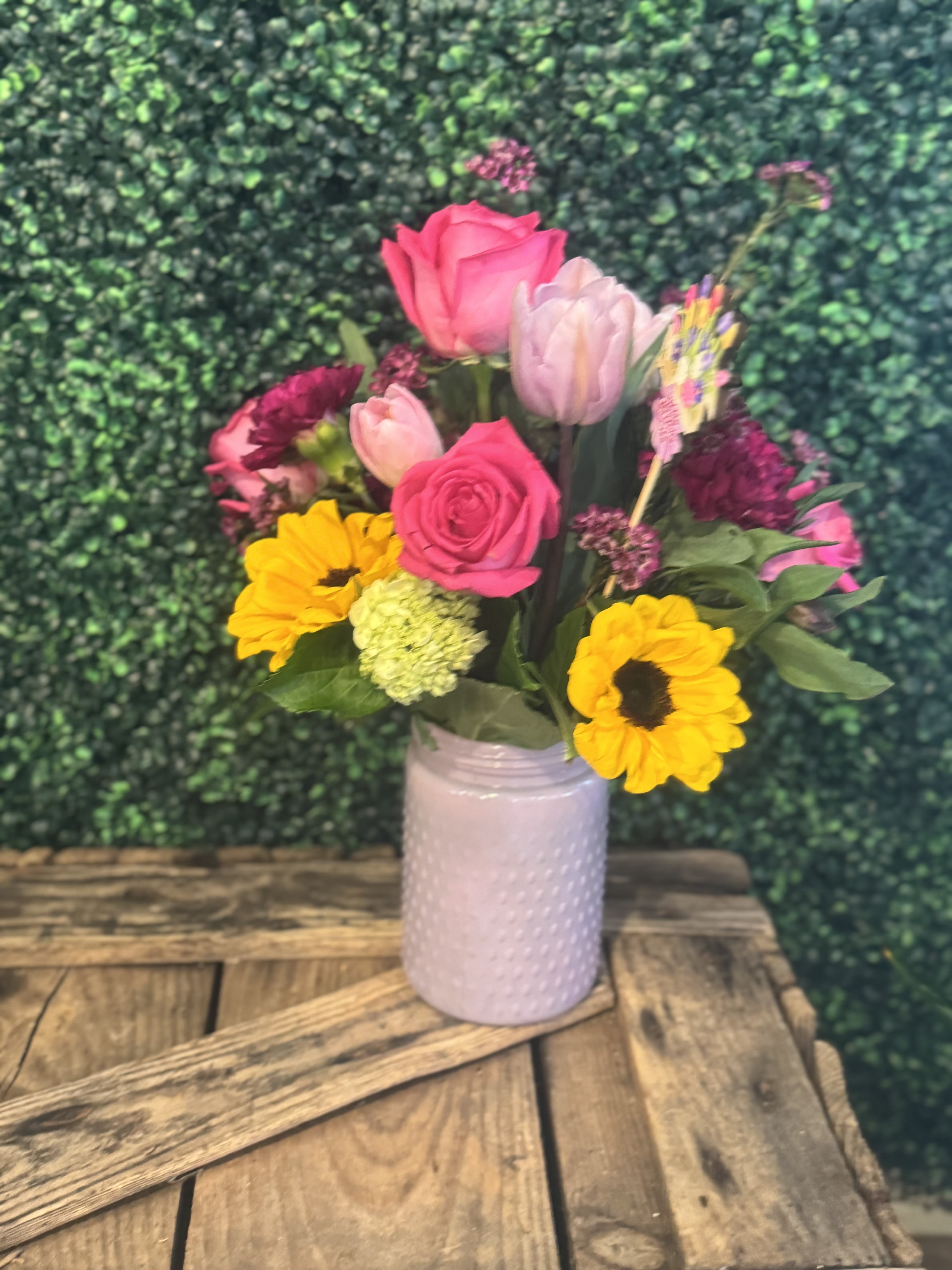 Mother's Day Country Splash - This arrangement is a perfect way to show some love! It can consist of roses, tulips, carnations, sunflowers, hydrangeas, etc.