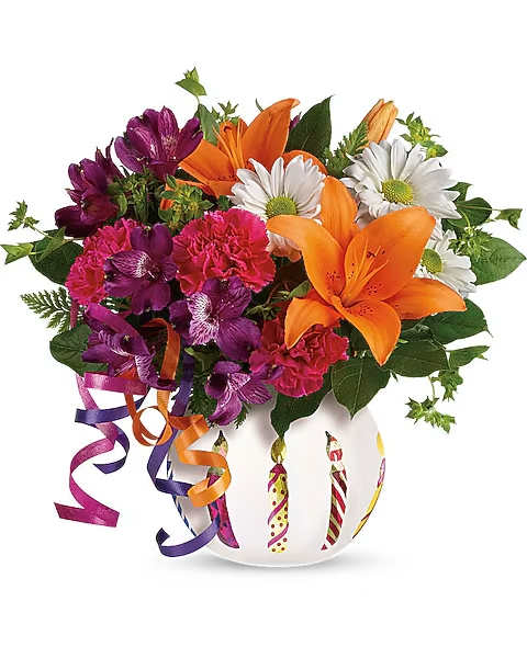 Party Starter Bouquet - Party time! Celebrate their special day in a fun, festive way with a surprise delivery of orange, purple, and hot pink blooms in an adorable birthday candle bowl. Colorful curling ribbons add to the party pizzazz!