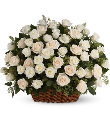 Bountiful Rose Basket - A beautiful bountiful basket of luminous white roses that feels so fresh natural and welcomed in a home or at a service. White and cr?me roses with fragrant seeded eucalyptus beautifully presented in a large basket.Approximately 25" W x 20 1/2" H Orientation: One-Sided As Shown : T233-1A
