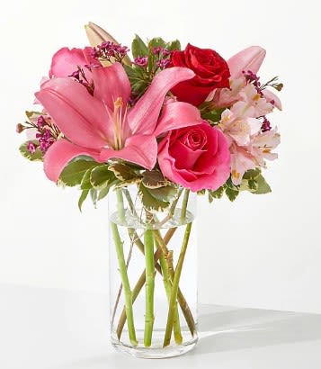 Lucky in Love Bouquet - Fall in love with the red and pink florals of our Lucky in Love Bouquet, a timeless blend of staple stems to make your anniversary, Valentine's Day, or just another Tuesday even more swoonworthy.