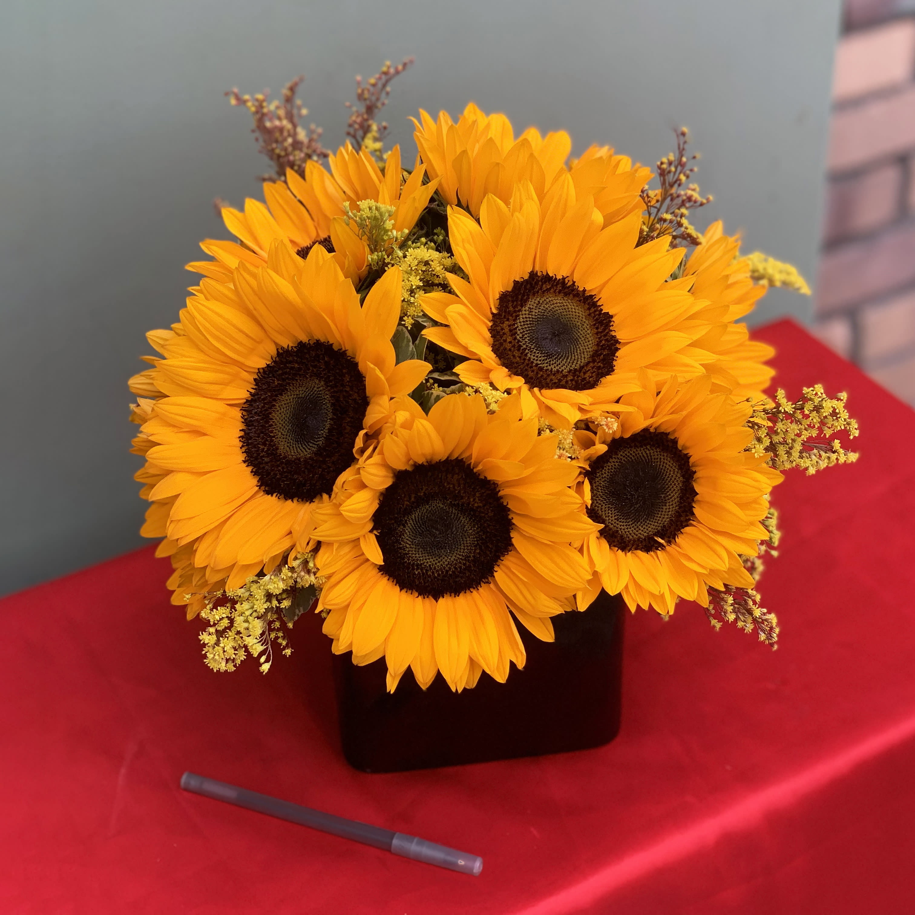 The Sunflower  - A pretty design of Sunflowers and Greens. 