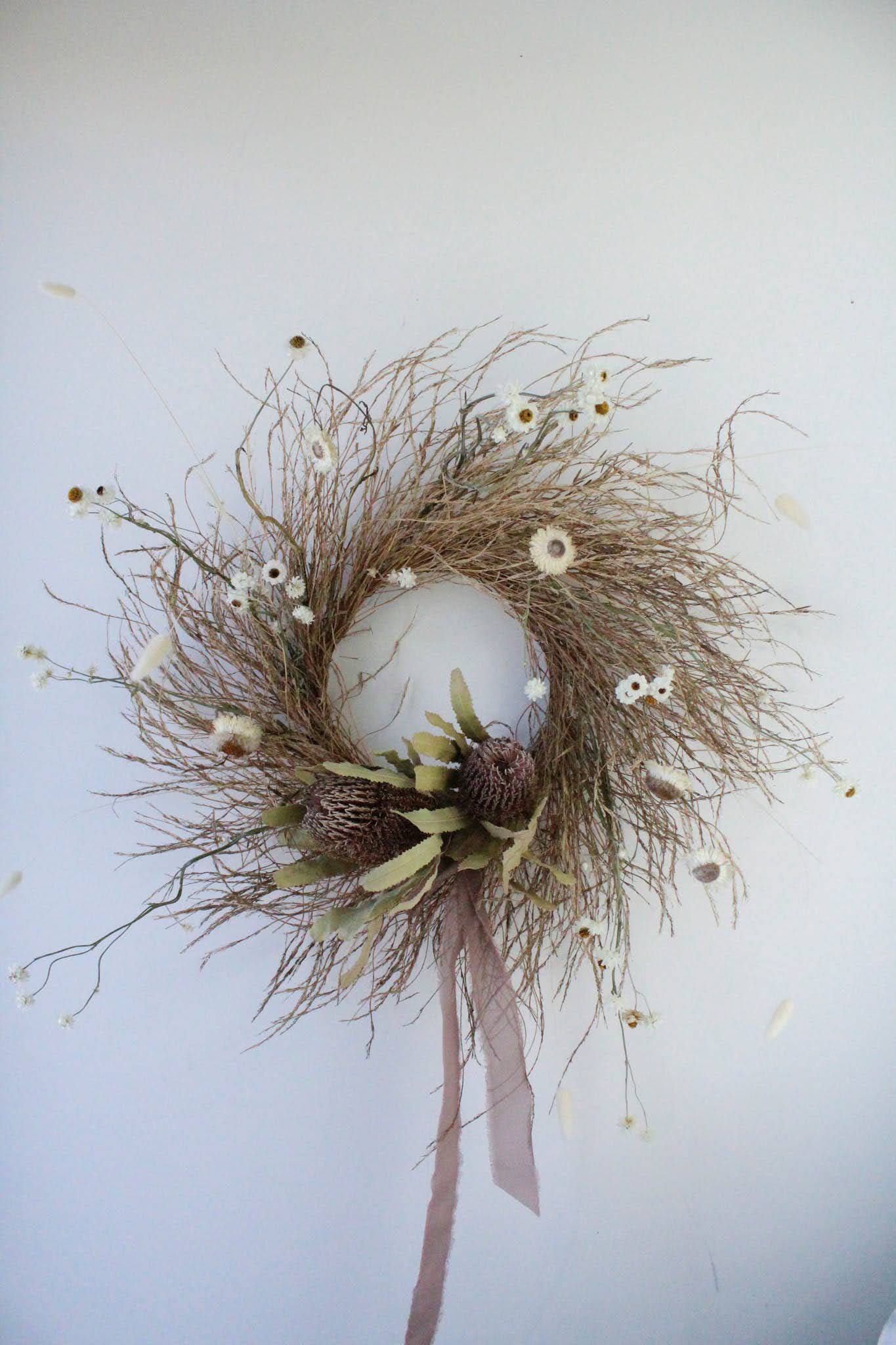 Large Spring Wreath - The perfect wreath to accent any door or wall.  *Images are a representation of our design style. Each arrangement is made to order and flower selection will vary due to product availability the week of your order.