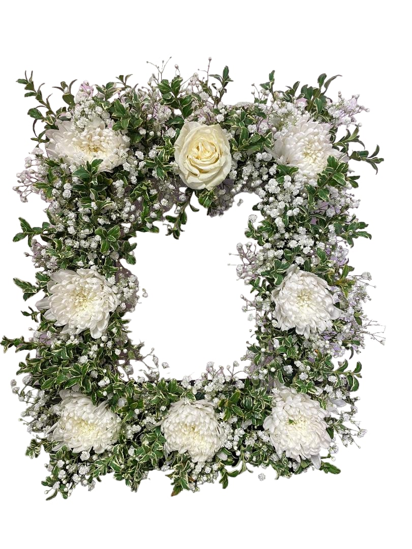 White floral wreath with roses and chrysanthemums
