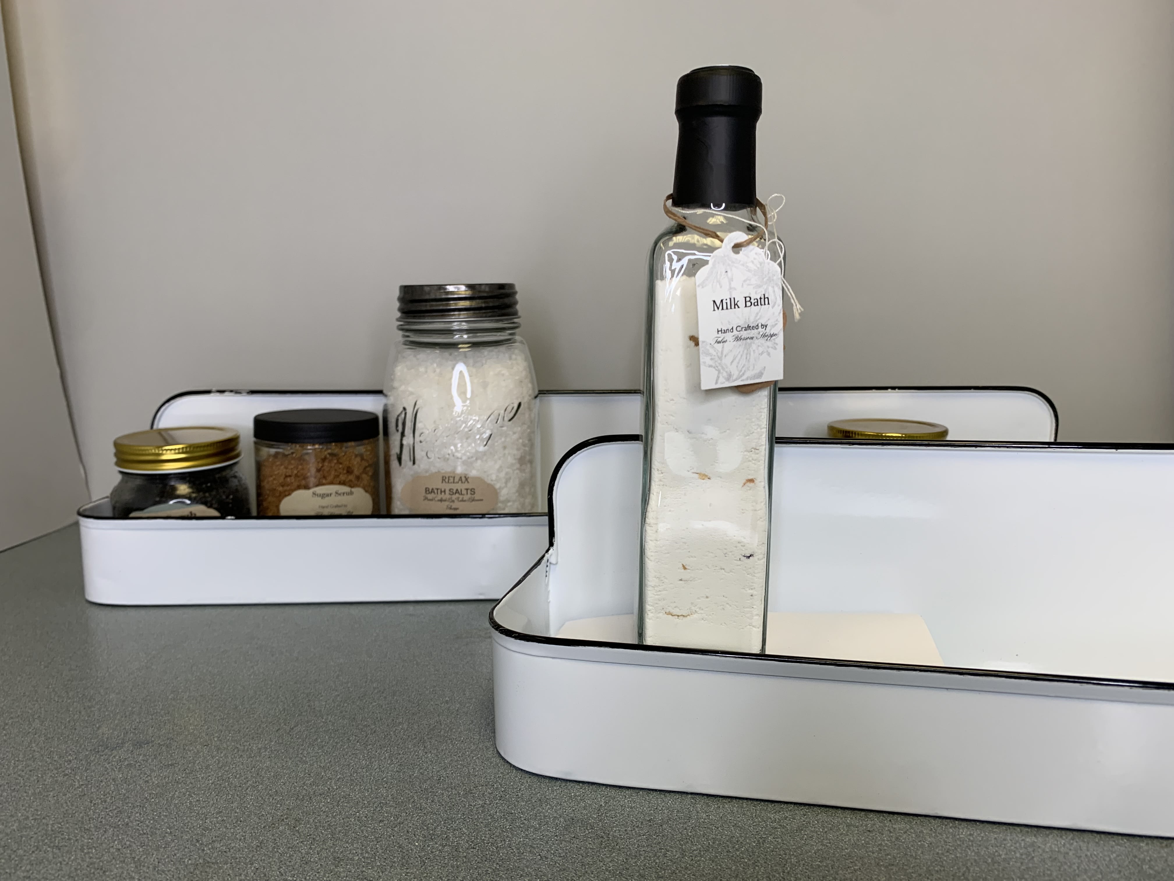 Gift tray with bath salts and a milk bath bottle