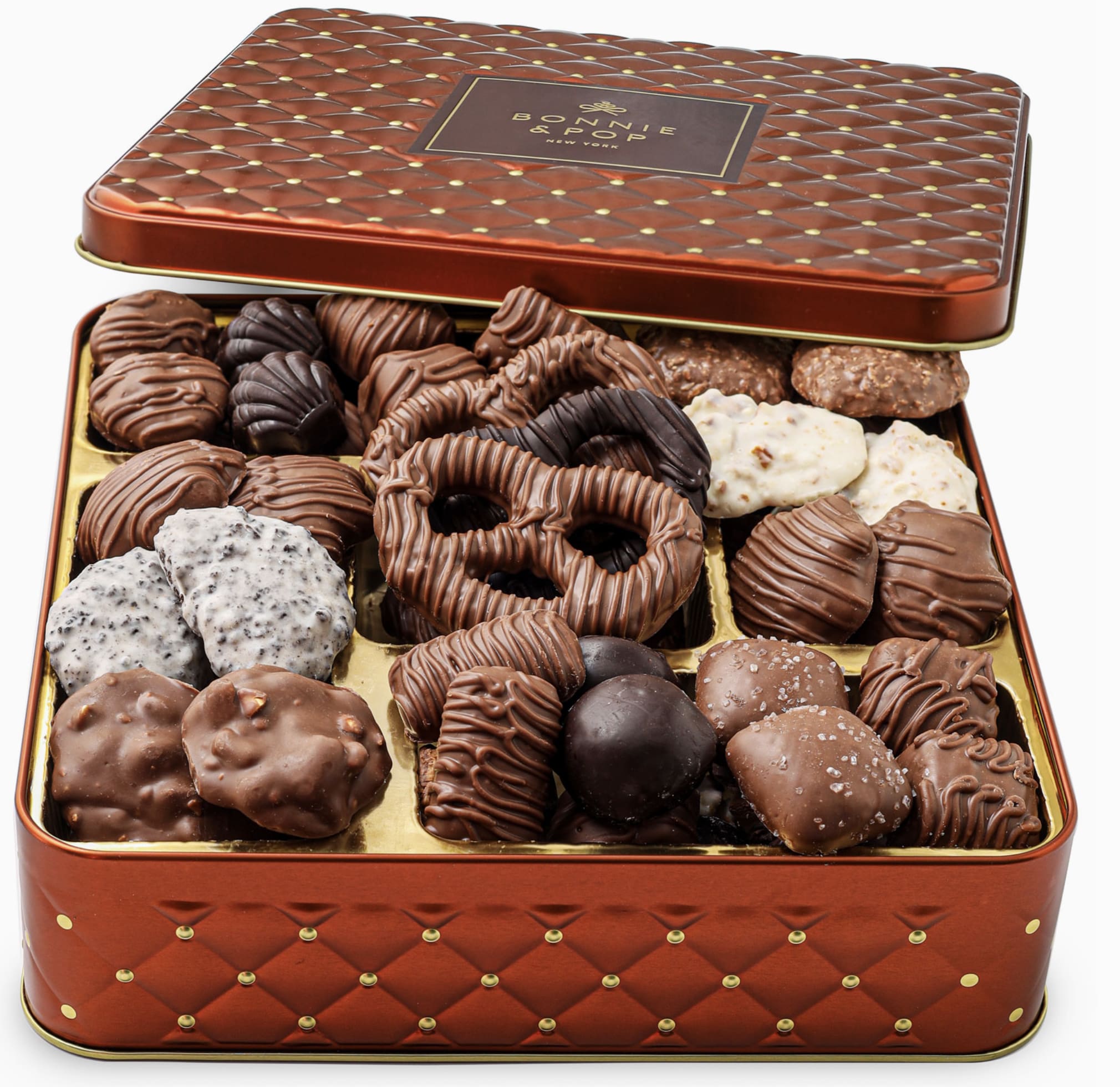 The Sweet and Salty Gift Tin - This gourmet chocolate gift box comes beautifully arranged in a square keepsake tin, filled with an irresistible selection of premium chocolate treats. Whether you're celebrating a birthday, holiday, corporate milestone, or just spreading joy, this indulgent chocolate gift delivers wow-factor and flavor in every bite. What’s Inside Peppermint Patties, Milk Peanut Butter Squares, Double Dark Silks, English Toffee, Almond Clusters, Pretzel Clouds, Pecan Snappers, French Meltaways, Sea Salt Caramels, Pecan Meltaways, Pecan Snappers, White Cookie Crunch, Milk Haystacks, Dark Pretzels, and Milk Pretzels.