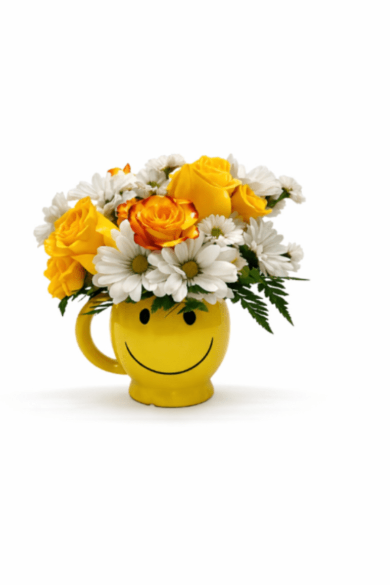 Yellow smiley-face mug filled with yellow roses and white daisies