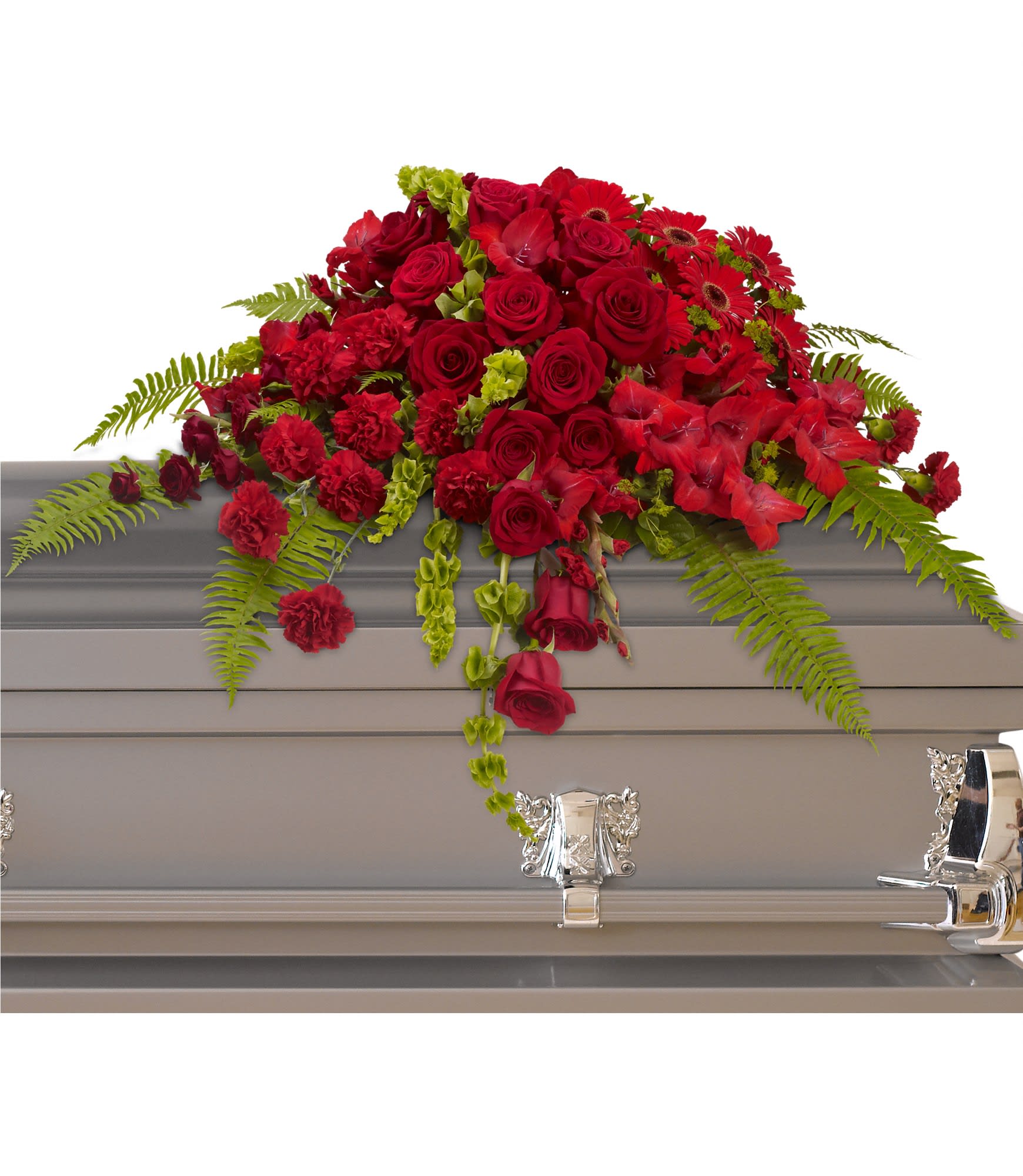 Red roses and gerbera daisies arranged on a gray casket