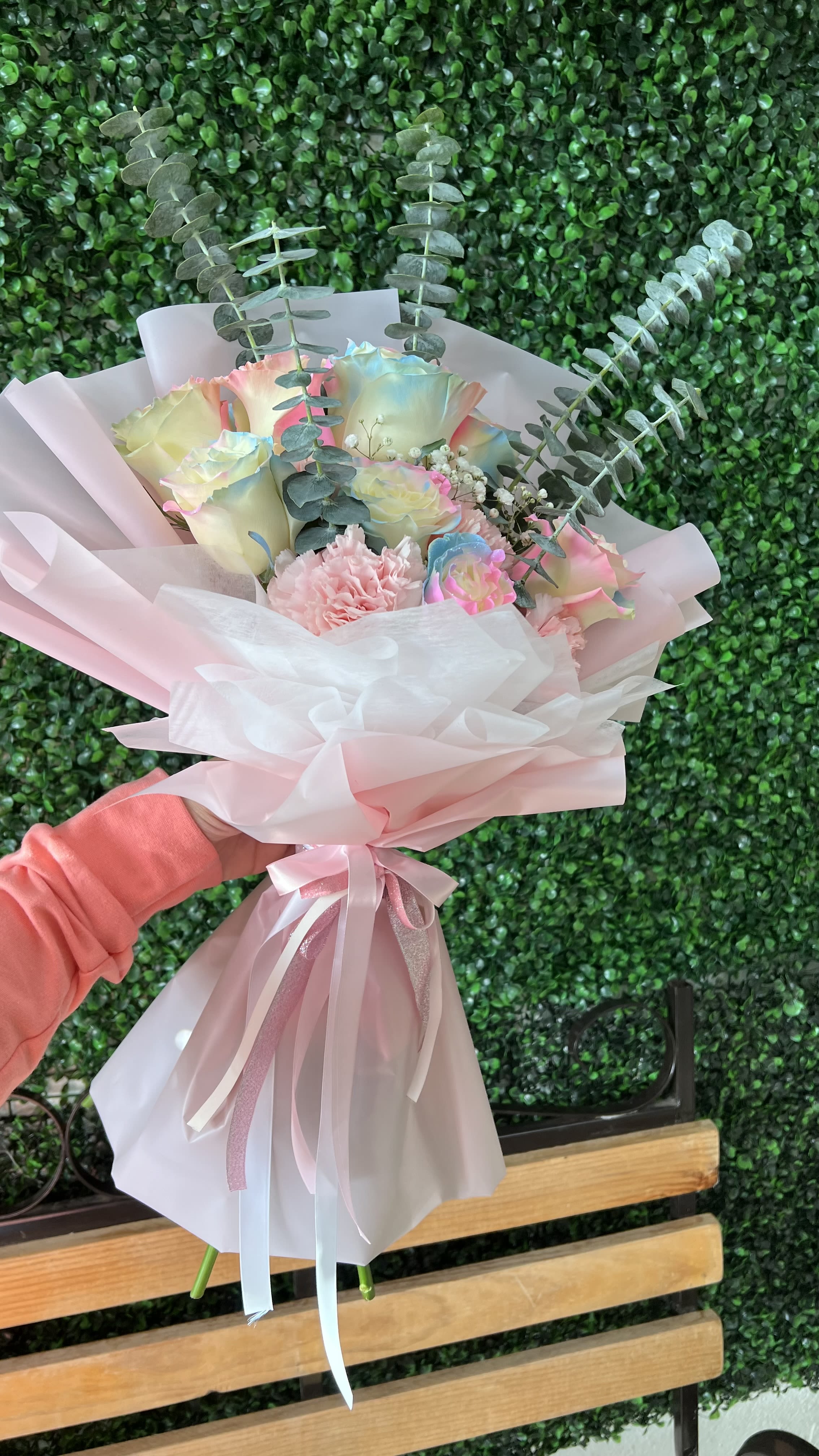 Pastel whisper bouquet - A delicate hand-tied bouquet featuring soft pastel tones and airy textures wrapped in elegant layers for a light, dreamy and modern presentation perfect for any heartfelt occasion