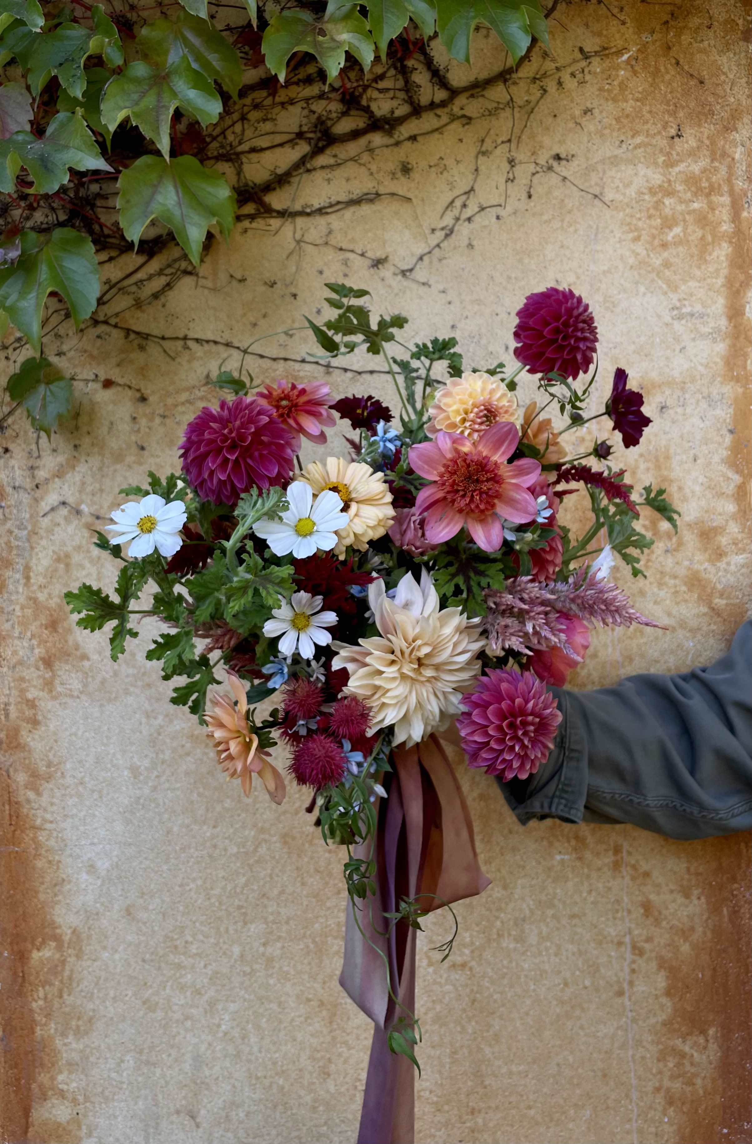 Bridal Bouquet - Our classic garden-style bridal bouquet, available for pickup only. Please specify the color scheme you would like us to work within. We will do our best to accommodate your colors using whatever material is the freshest and closest to your request. If you do not specify a color scheme, we will make your bouquet designer's choice.  Bouquet comes tied with a hand-dyed silk ribbon in a color that compliments the bouquet. (PLEASE NOTE: This option of wedding ordering comes with very minimal customization. For much more customization options, please visit our website and fill out our inquiry form).  Pickup days are Wednesday through Saturday. Wednesday pickup MUST be after 2PM. Please specify the time in which you would like to pick it up and we will call you if we cannot accommodate.
