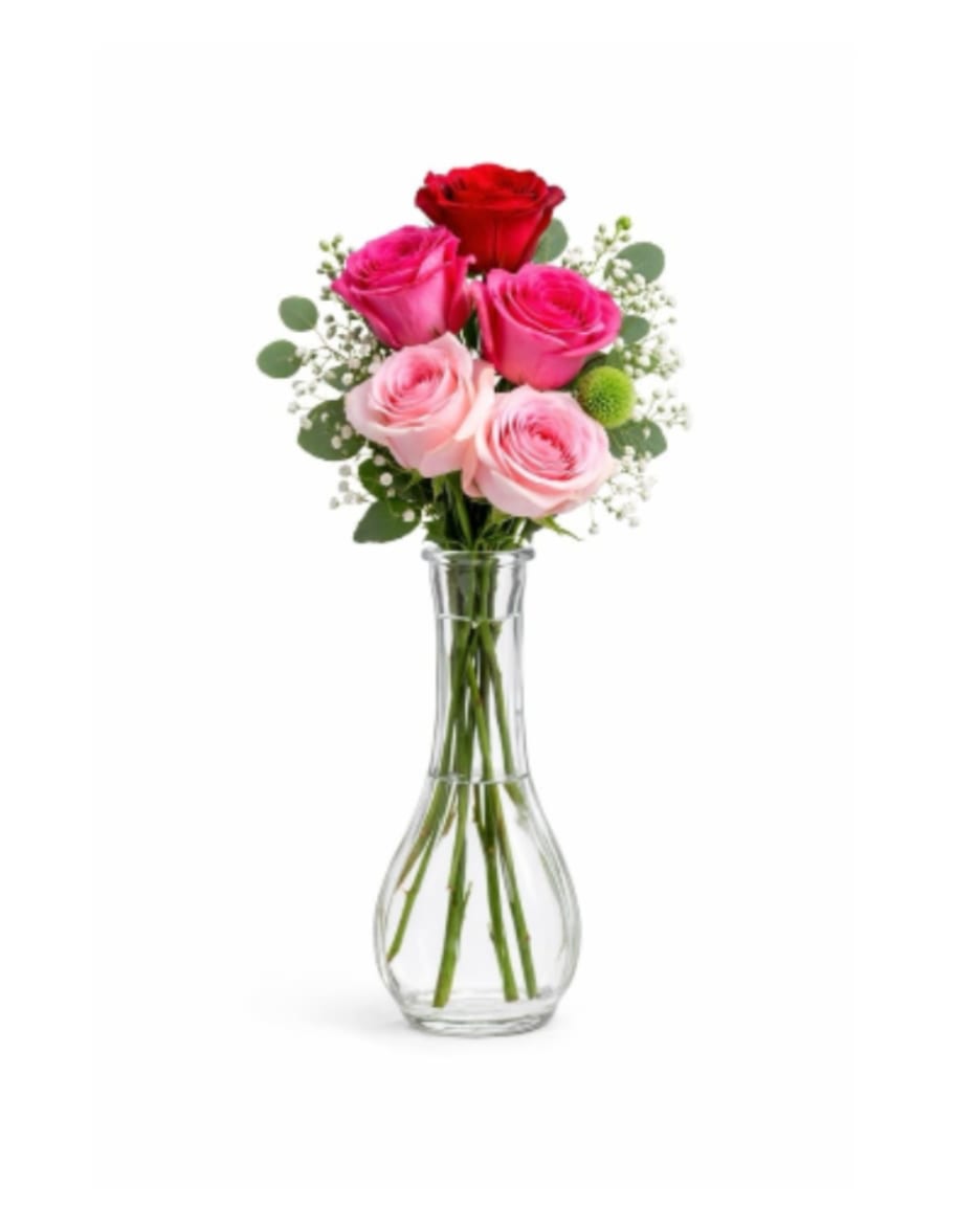 Pink Kiss Bud Vase - A sweet and romantic flower arrangement featuring a beautiful mix of blush and hot pink roses, finished with airy baby’s breath and fresh greenery. Designed in a tall clear glass vase, this piece creates a soft, elegant, and uplifting presence.  Each arrangement is Designer’s Choice, thoughtfully created with fresh seasonal blooms. Flower varieties and color tones may vary based on availability while preserving the overall style, palette, and quality.  Perfect for Valentine’s Day, anniversaries, birthdays, romantic gestures, thinking of you, Mother’s Day, or a heartfelt “just because” surprise.  Same day flower delivery available in Southwest Florida, including Naples, Bonita Springs, and Fort Myers Beach. 