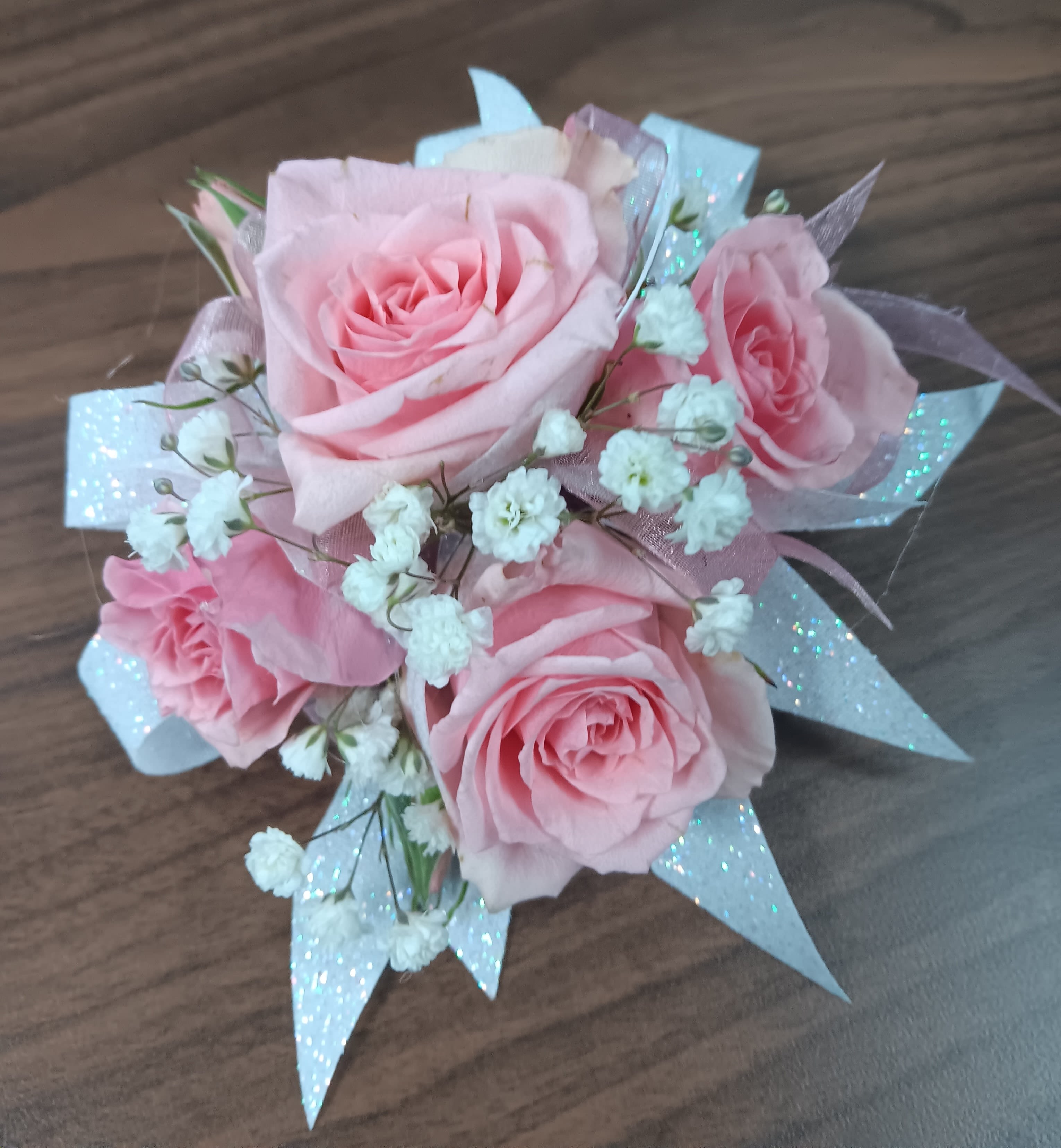Pink Rose Corsage by BloomNation™  - A classic pink corsage hand-tied in pink satin that compliments any outfit. A beautiful addition to any prom, formal, or wedding event. 
