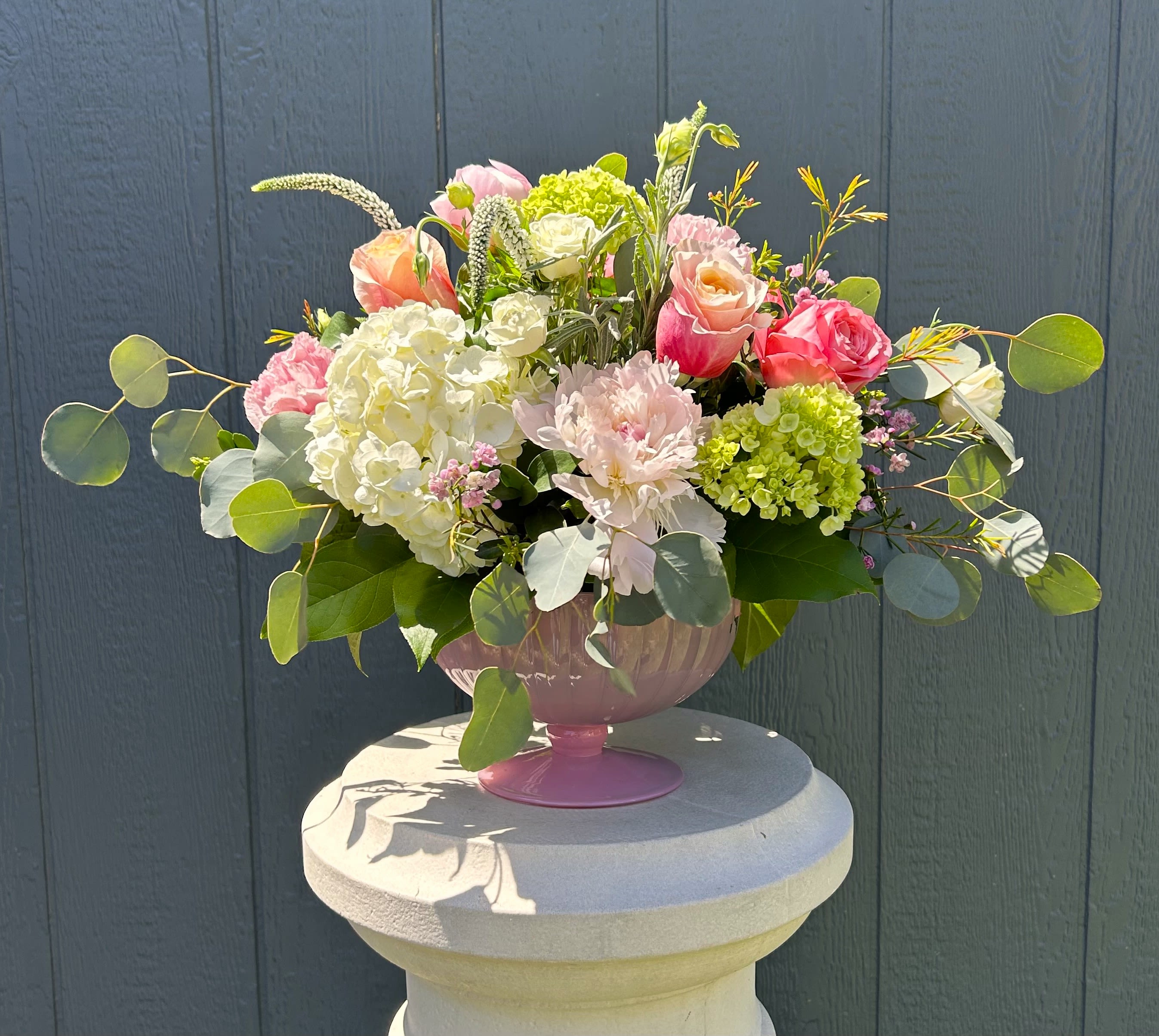 Mother's Love - Mother's Love is a beautiful, lush centerpiece with Peonies &amp; Garden Roses, in a white footed bowl. 