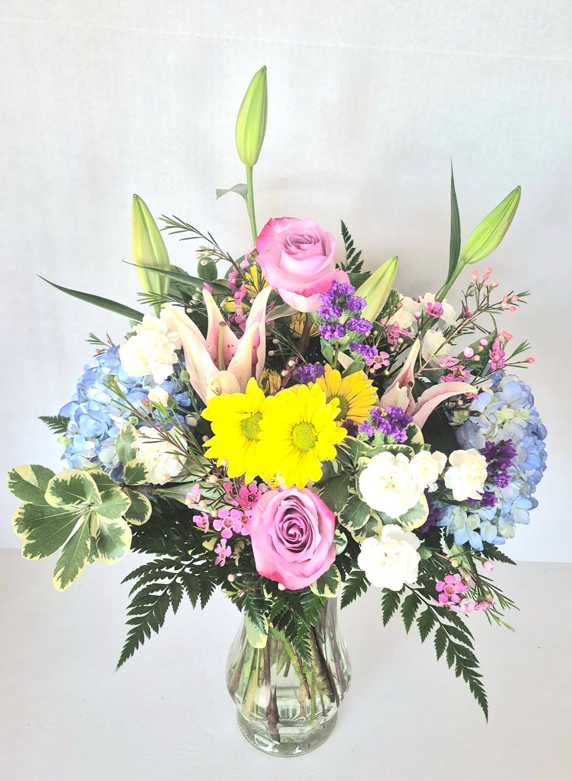 Awesome Vase! - Roses, daisies, hydrangeas, lilies and beautiful fillers and greenery arranged in a tall vase for any occasion that requires a smile!!