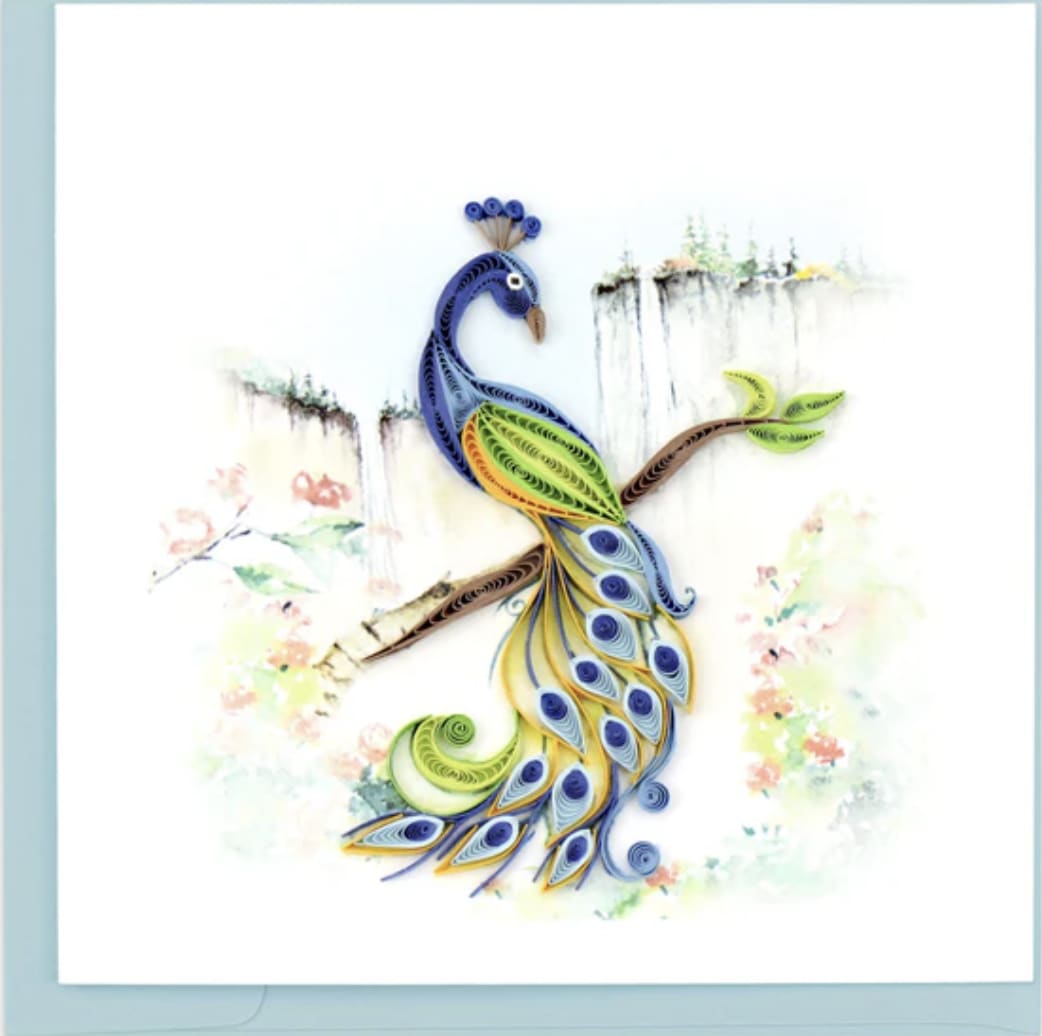 Greeting card with colorful quilled paper peacock on a branch over a soft floral watercolor background