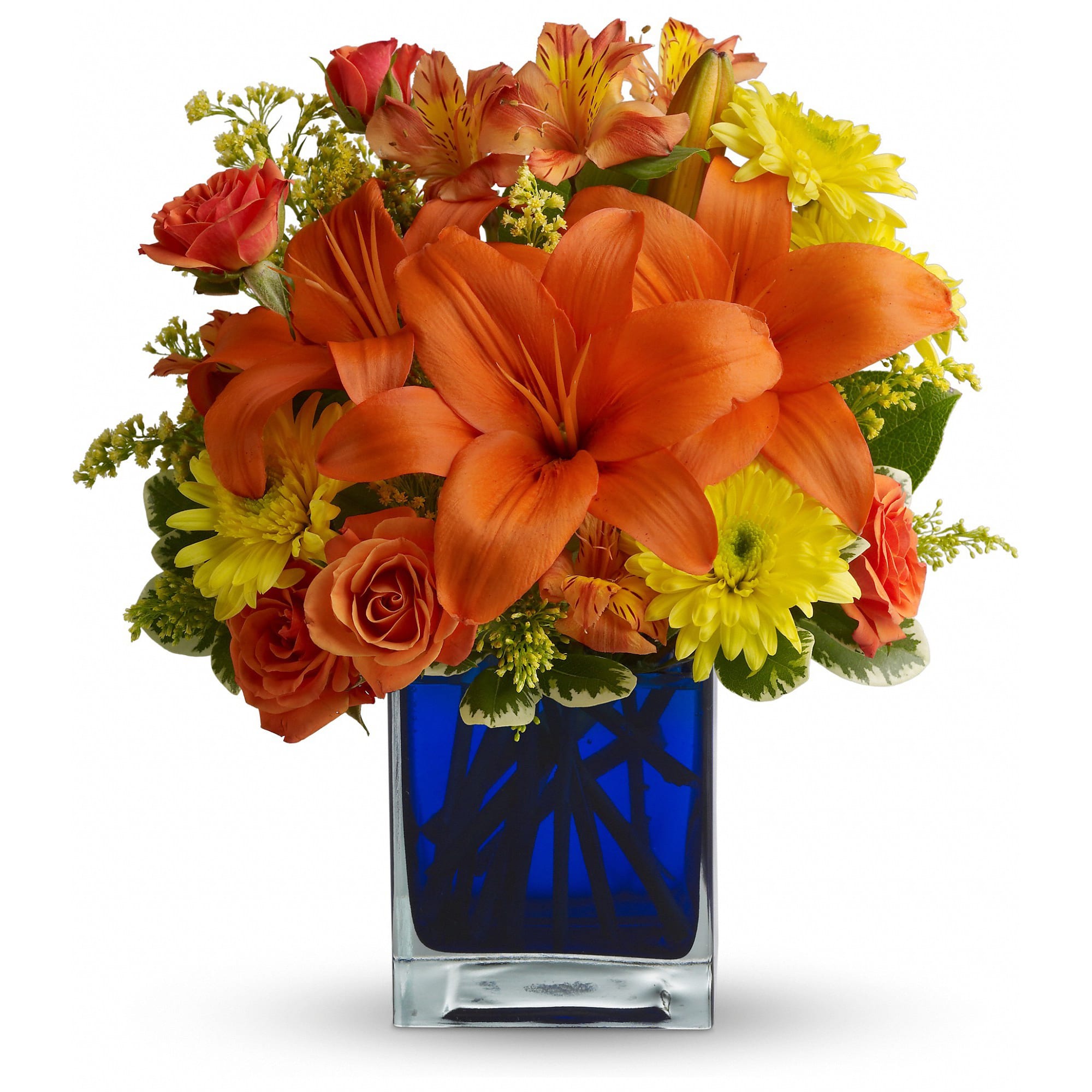 Orange lilies and roses with yellow daisies in a blue glass vase