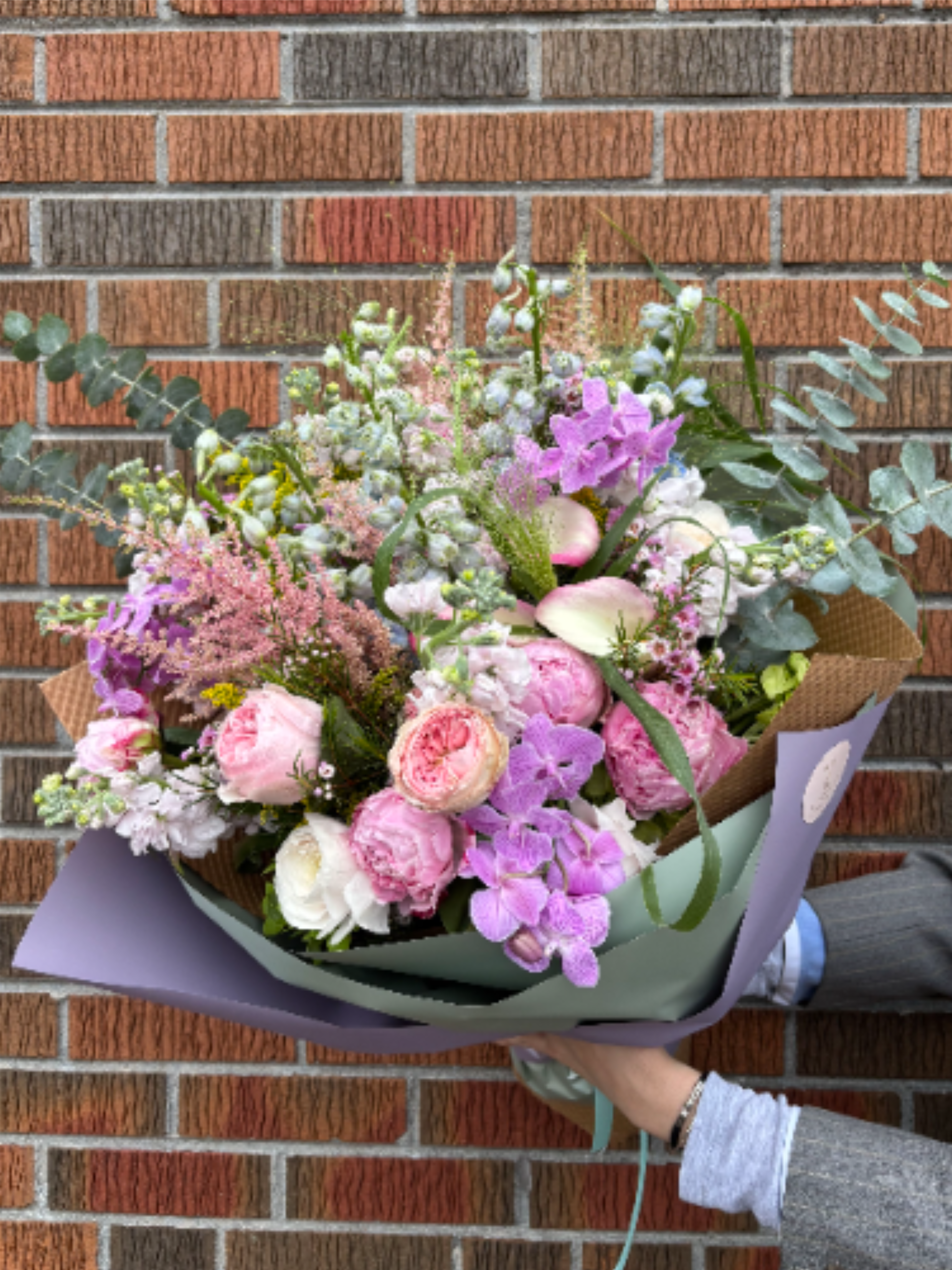 BP28 - Natural Garden Bouquet - A vibrant winter mix featuring peonies, calla lilies, pink orchids &amp; lush seasonal greens. This arrangement brings warmth and color to cold days. *Depends on availability, flowers may change