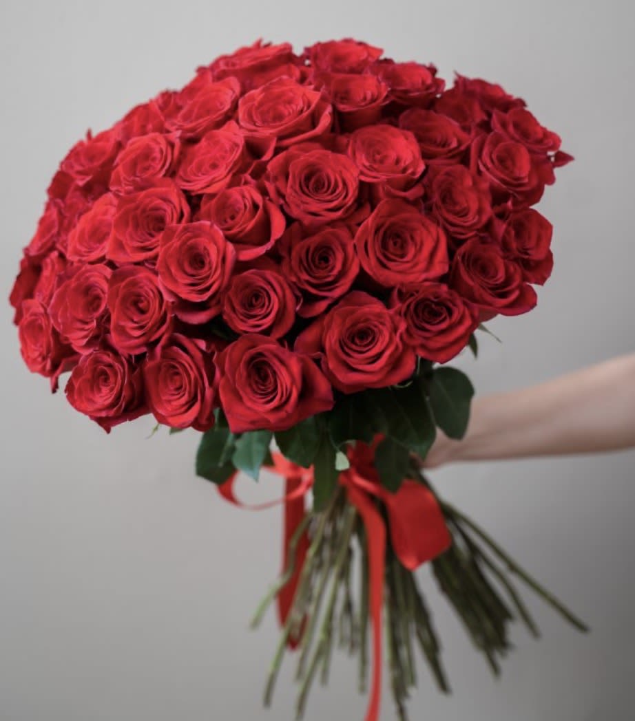 Passion in Bloom Bouquet – Red Roses - Intense, elegant, and unforgettable — the Passion in Bloom Bouquet showcases 12 radiant red roses, the timeless symbol of deep love and devotion. Wrapped in soft blush and gold-toned paper and accented with delicate baby’s breath, this bouquet exudes romance and sophistication in every detail.  Handcrafted with care by 1800 Blooms, it’s the perfect choice for anniversaries, romantic gestures, or heartfelt confessions. Each rose speaks volumes of passion, admiration, and the beauty of true affection.  ️ Features:  Includes 12 premium red roses with baby’s breath accents  Symbolizes love, passion, and admiration  Available for same-day delivery in Bronx &amp; surrounding areas.