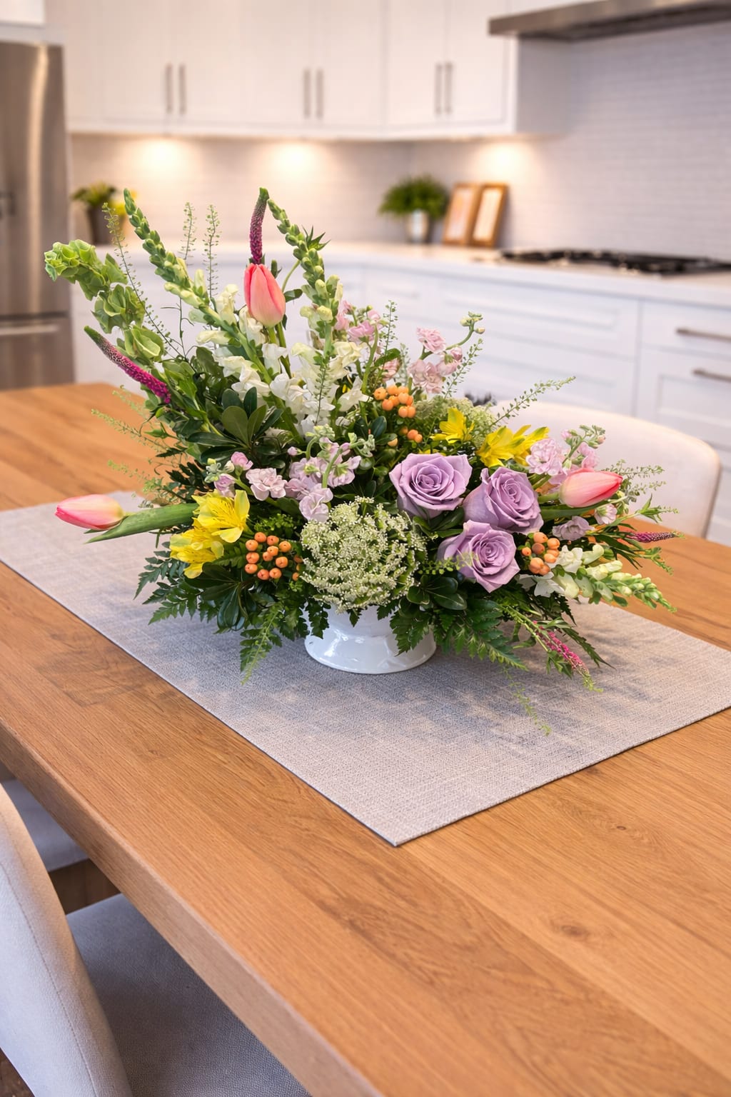 Morning Meadow  - Bring your Easter table to life with one of our beautifully handcrafted centrepieces Designed with soft spring tones, fresh blooms, and lush greenery, each arrangement is thoughtfully created to add warmth and elegance to your holiday gathering. 