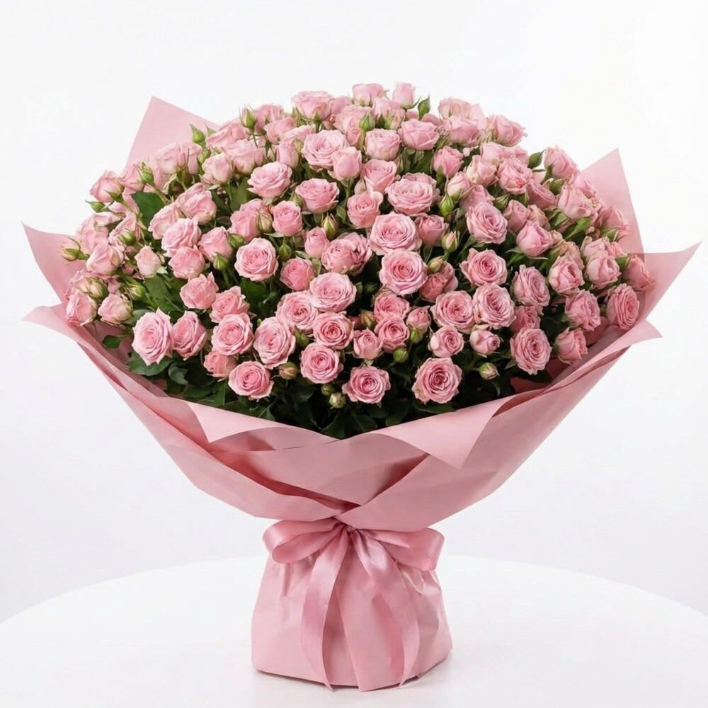 Blushing Garden Spray Rose Bouquet - Soft blush spray roses wrapped in elegant pink paper.