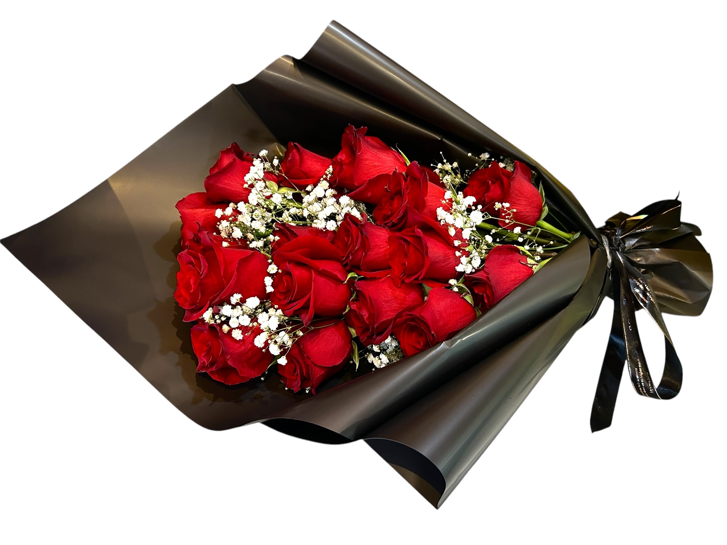 Bouquet of red roses wrapped in black paper with white baby's breath