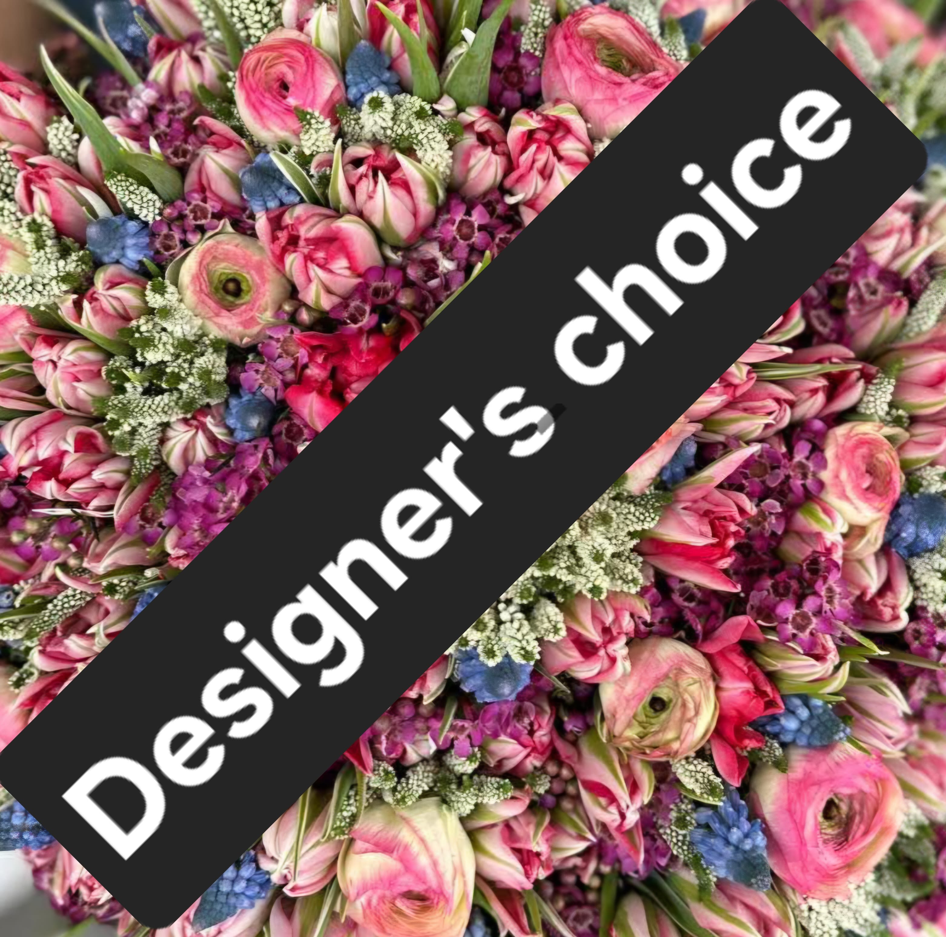 Designer's Choice - Movement - An exclusive one-of-a-kind composition crafted at the designer's descretion, showcasing the finest seasonal blooms in a refined, artictic expression.