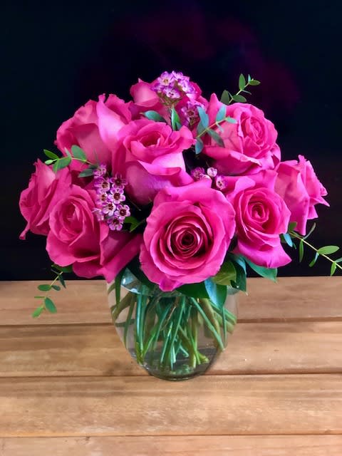Modern Dozen in Hot Pink - 12 premium hot pink roses in a low and lush style  