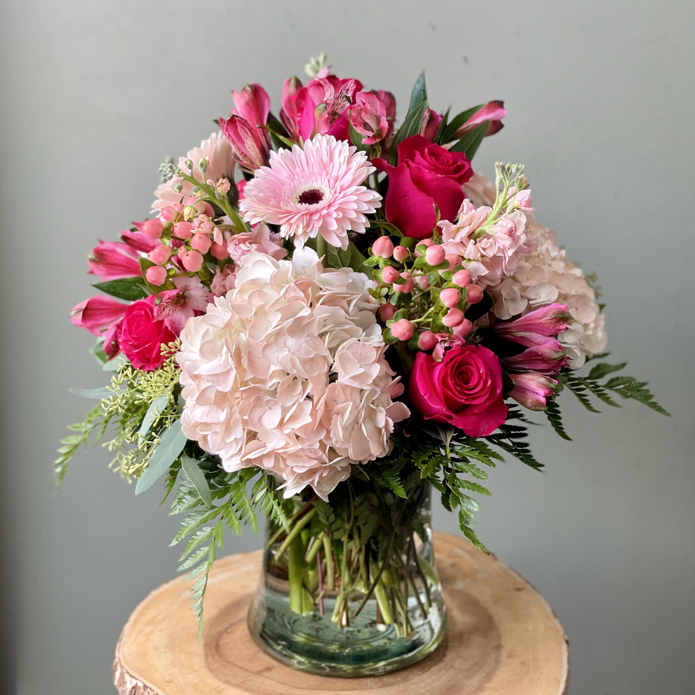 Blush &amp; Bold (SF106) - Soft where it matters, bold where it counts. Equal parts grace and strength! This lush arrangement pairs airy blush tones with vibrant pink blooms for a look that feels fresh, feminine, and unforgettable—just like her!