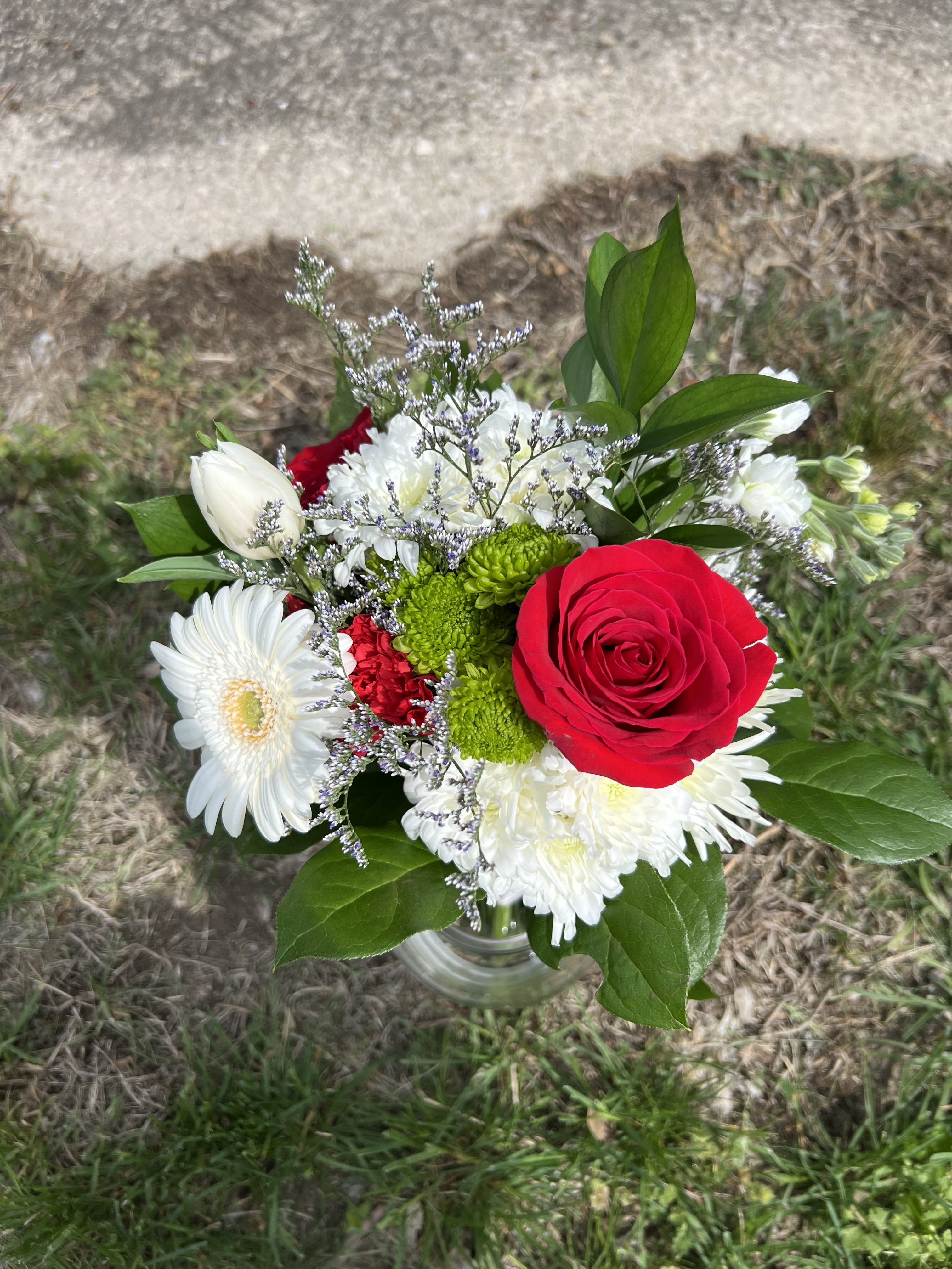 Red &amp; White Handheld Bouquet - An elegant hand-tied bouquet that will compliment any prom outfit. Filled with mixed flowers such as roses, daisies, and stock. *Vase not included*