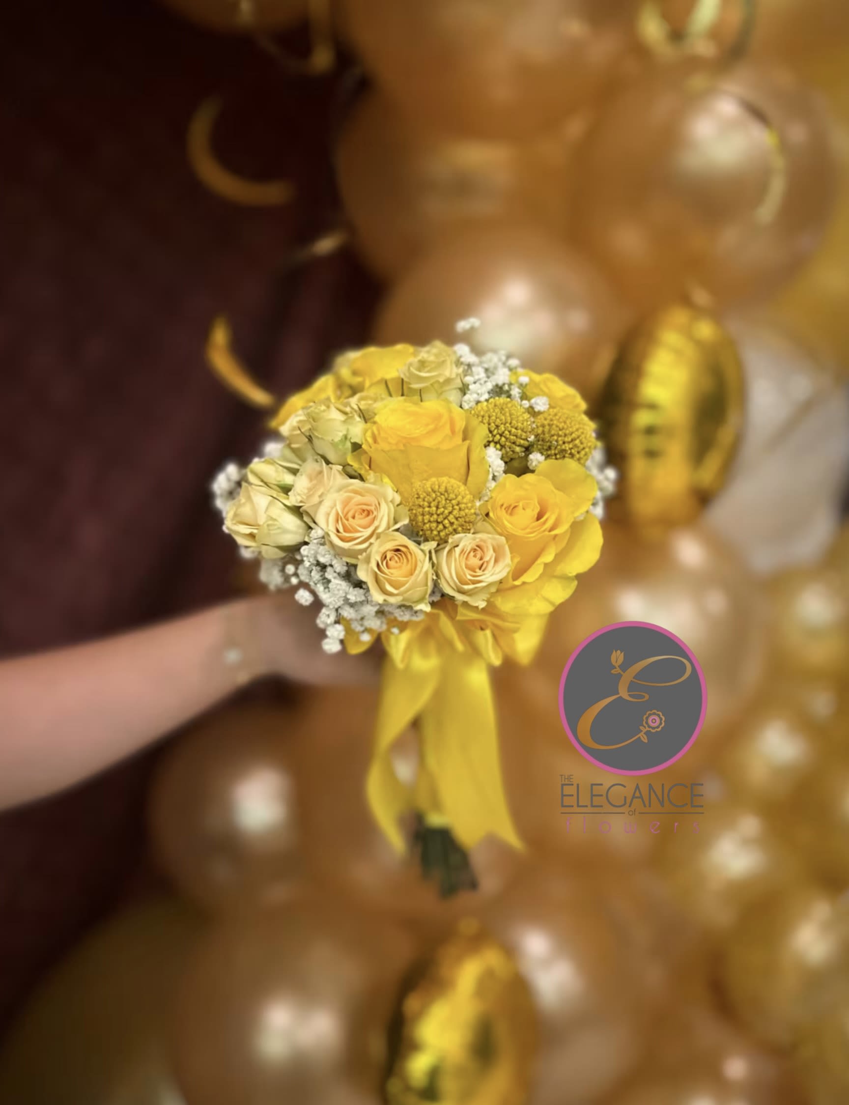 Yellow rose bouquet with baby's breath and a satin ribbon