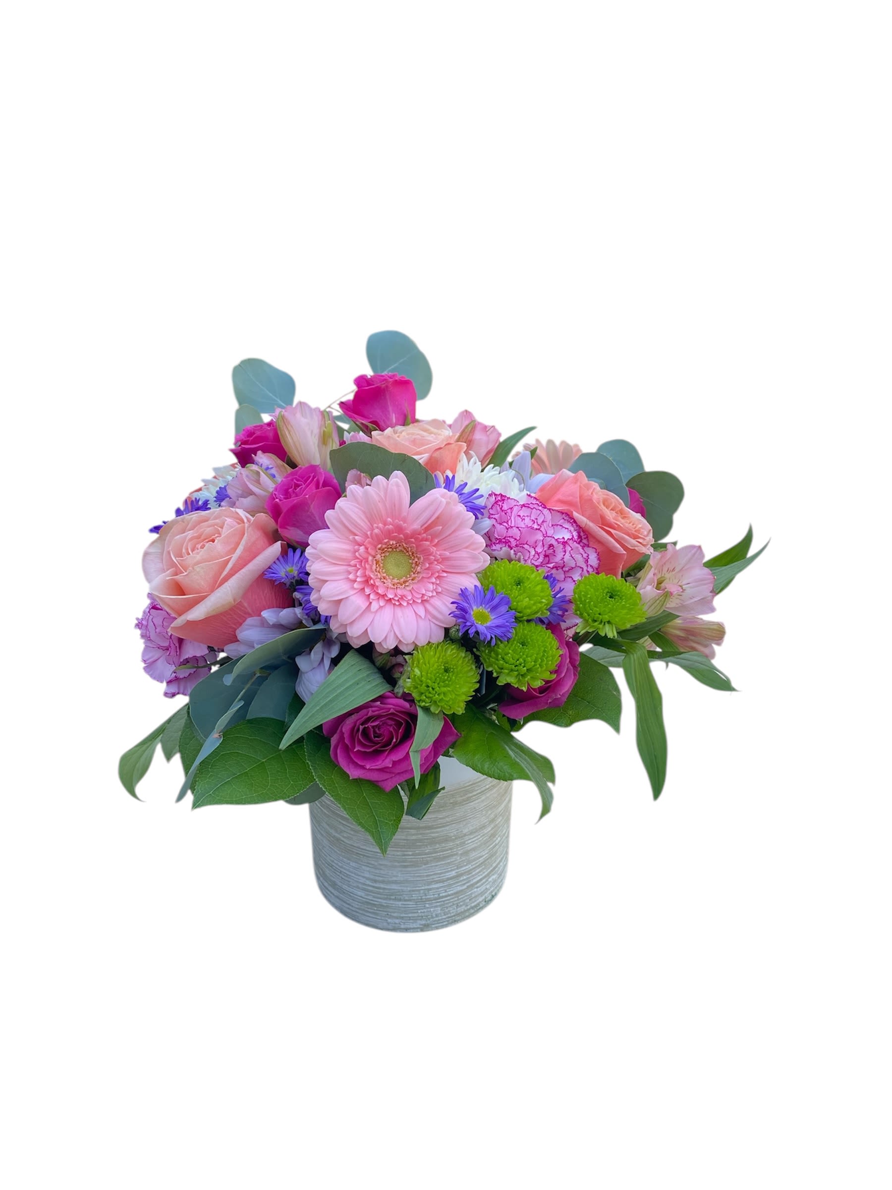 Pink and purple mixed bouquet in a gray vase