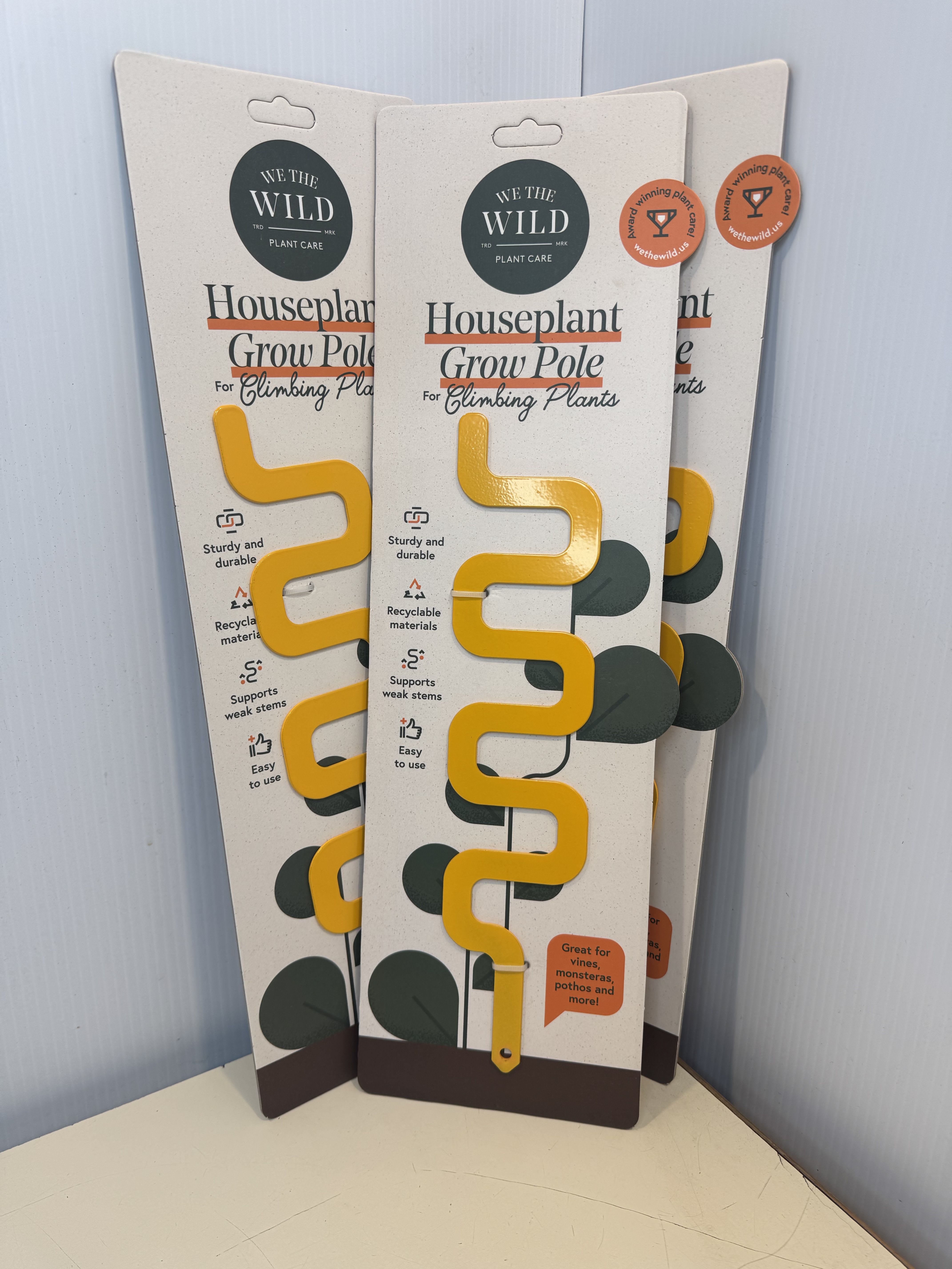 Packaged yellow houseplant grow poles for climbing plants