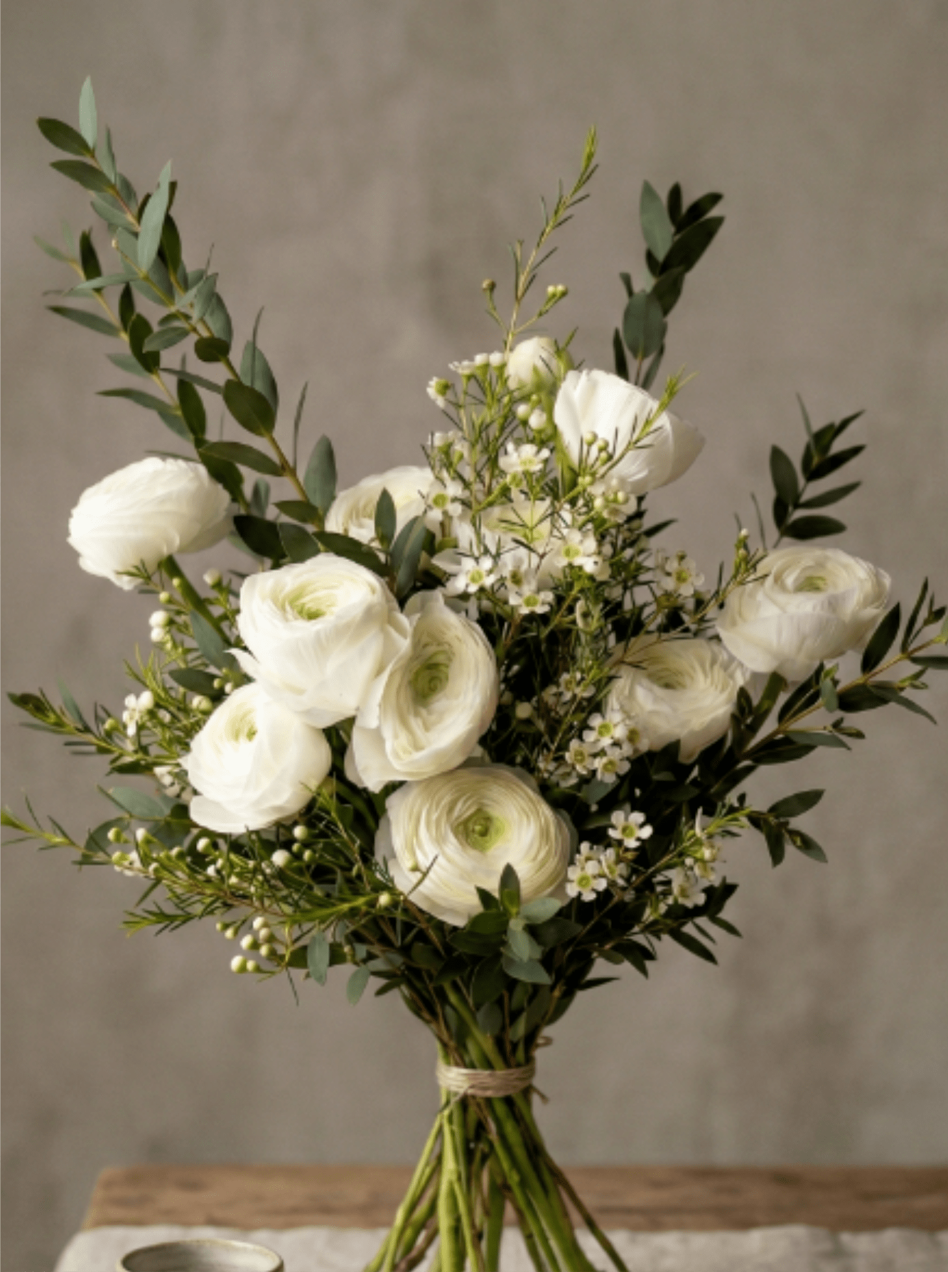 BP71 - White Ranunculus with Greeneries Bouquet - White Ranunculus mixed with greeneries. 