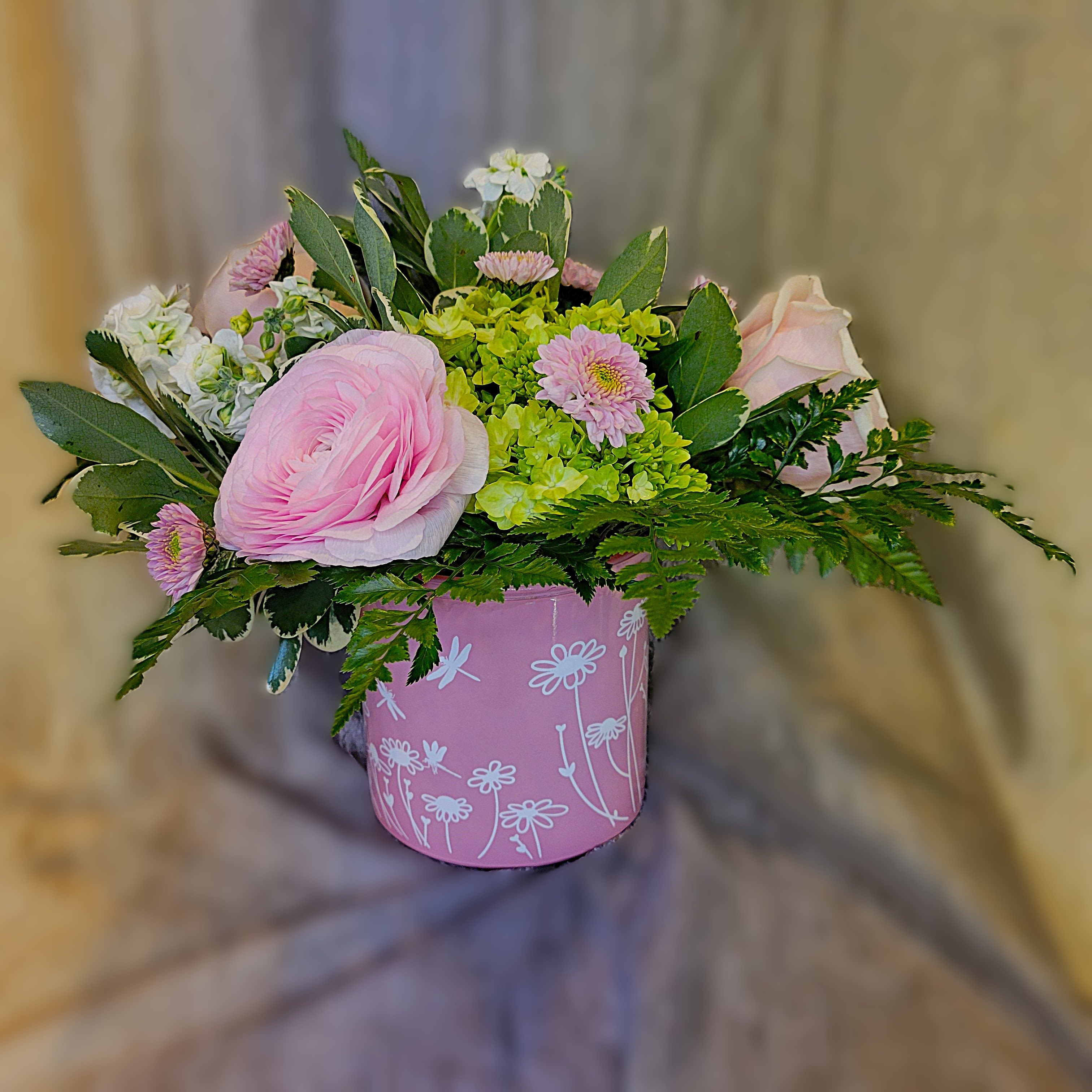 Poetry in Pink - PREORDER - A lush blend of pinks and fresh spring greens gathered in a rosy glass vase made for Mother’s Day. A sweet, garden‑kissed composition that glows with gratitude in every soft, shimmering shade. Available for delivery after 5/1/26