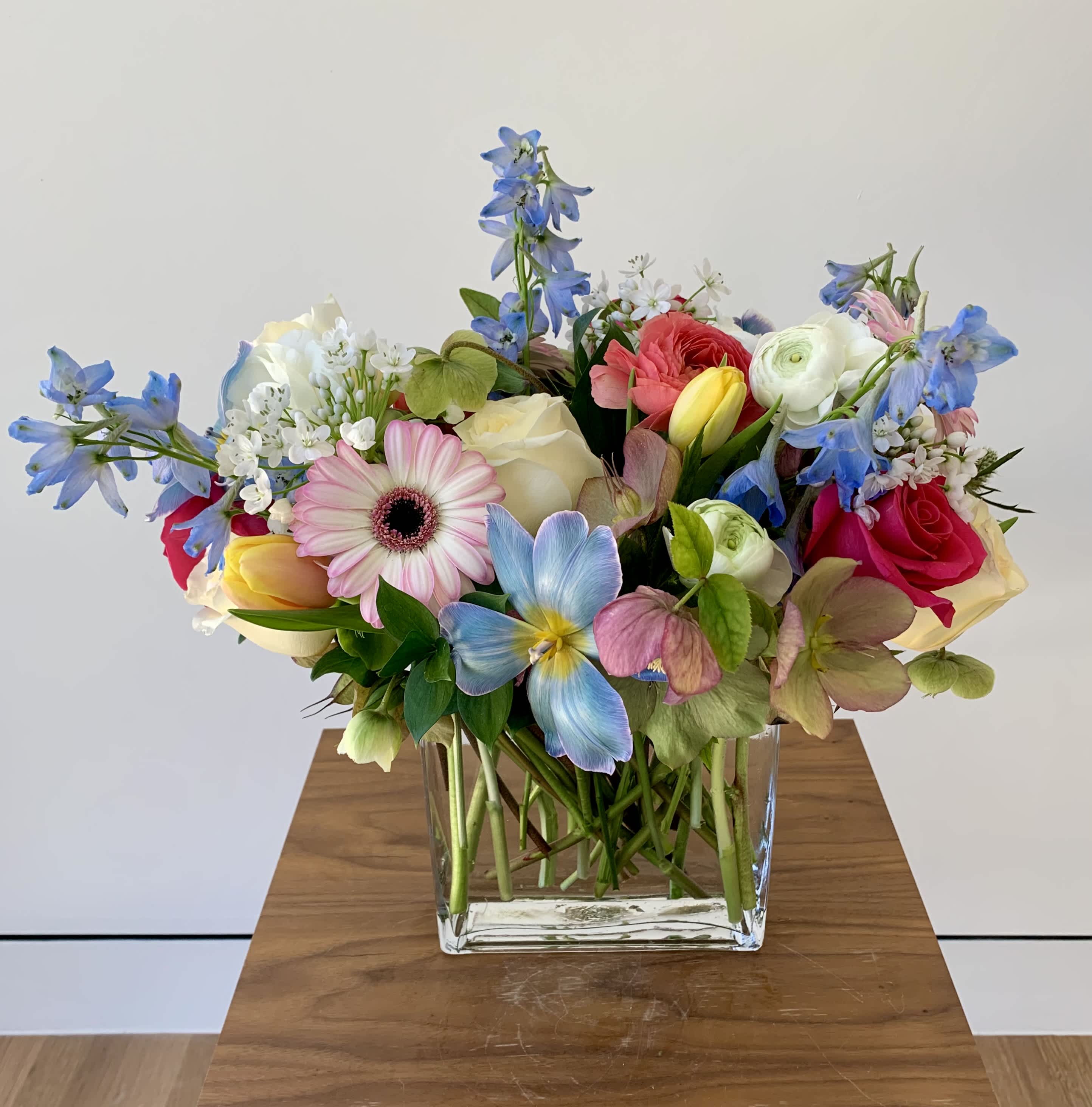 Colorful mixed bouquet in a clear glass vase