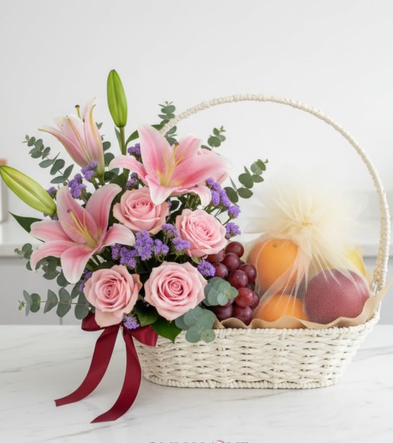Sweet Gift Basket FRUIT &amp; Flowers  - This luxurious basket , overflowing with fresh fruits &amp; Pink roses express gentle love, gratitude, and admiration, while eucalyptus brings calmness and healing energy., making this gift ideal for any festive occasion. Whether you’re congratulating someone, celebrating a birthday, or simply expressing your appreciation, this combination of gourmet treats and beautiful blooms will make the moment truly unforgettable.