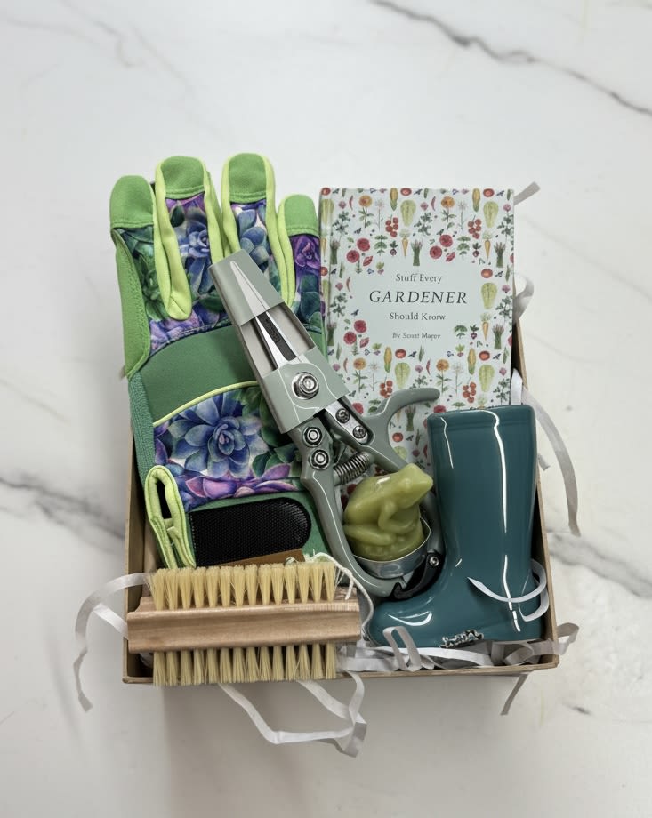 Gardeners' Gift  - Our Gardners' Box makes the perfect Mother's Day gift - a pair of gardening gloves, floral shears, gift book 'Stuff Every Gardener Should Know, nail brush,  ceramic boot bud vase and adorable froggie tea lite candle. 