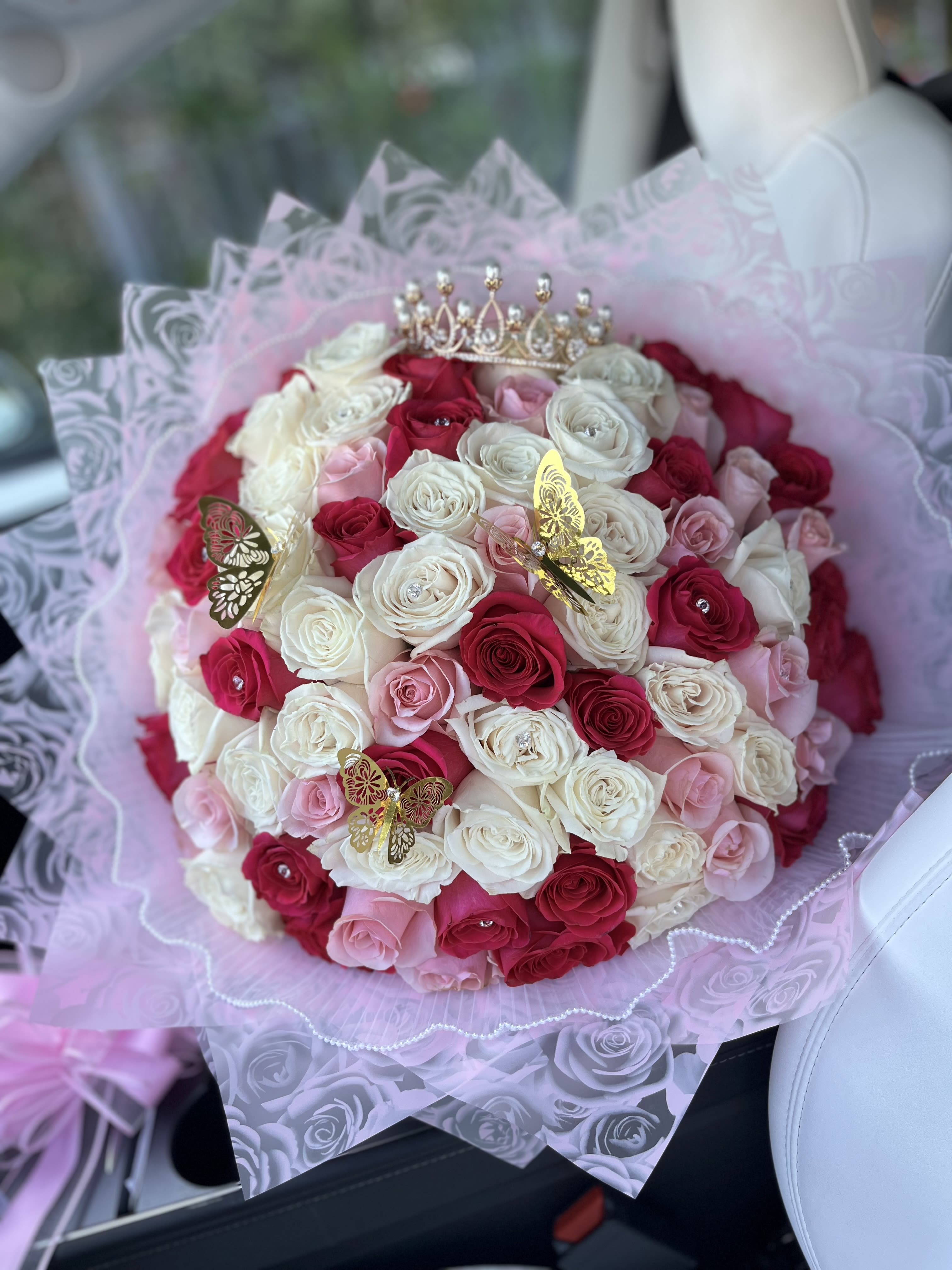 Perfect Princess Bouquet - 75 roses in white, light pink and hot pink with a tiara and butterflies  (wrapper color, tiara style and butterflies style may vary, depending on availability