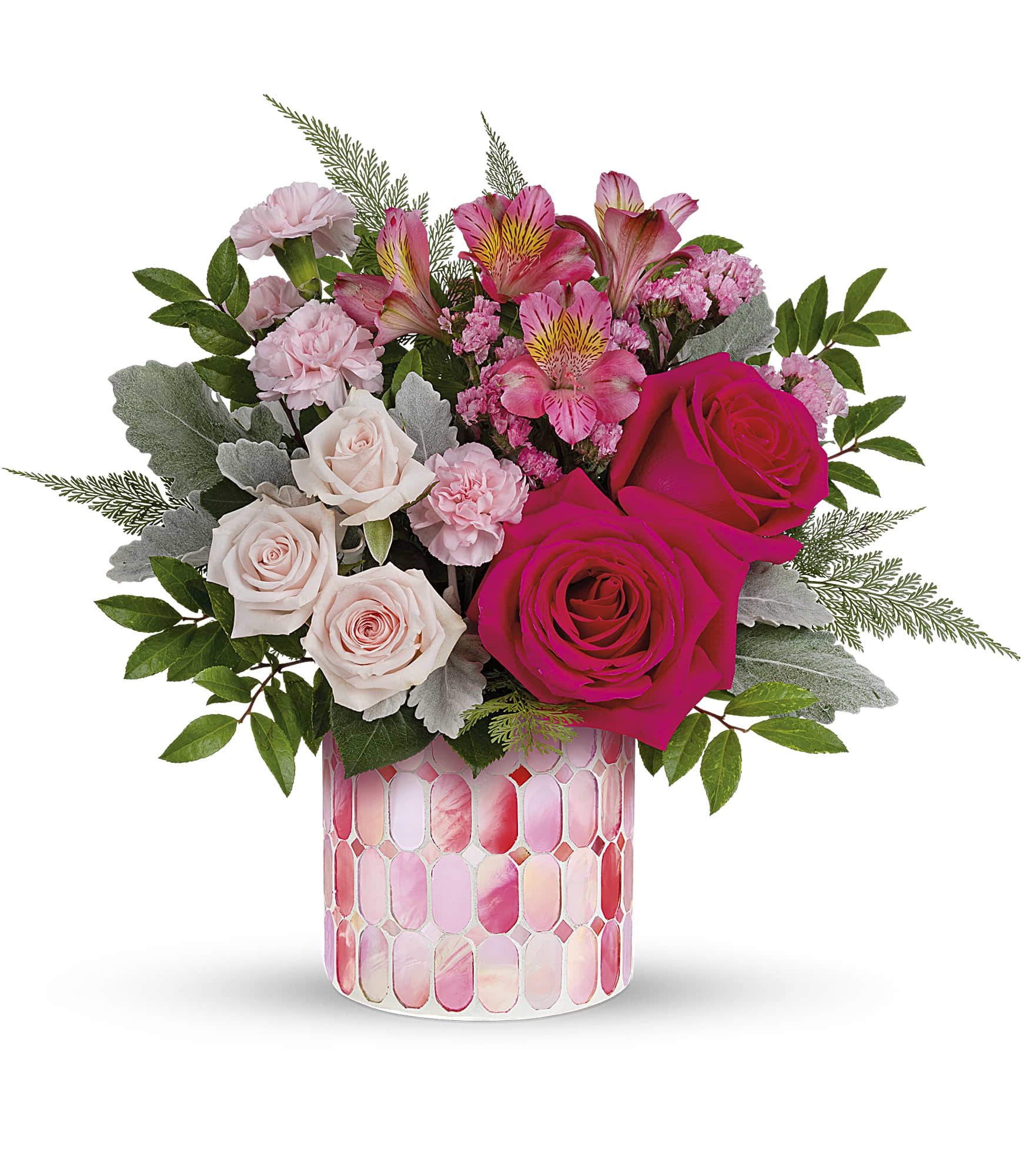 Pink and white mixed bouquet in a patterned glass vase