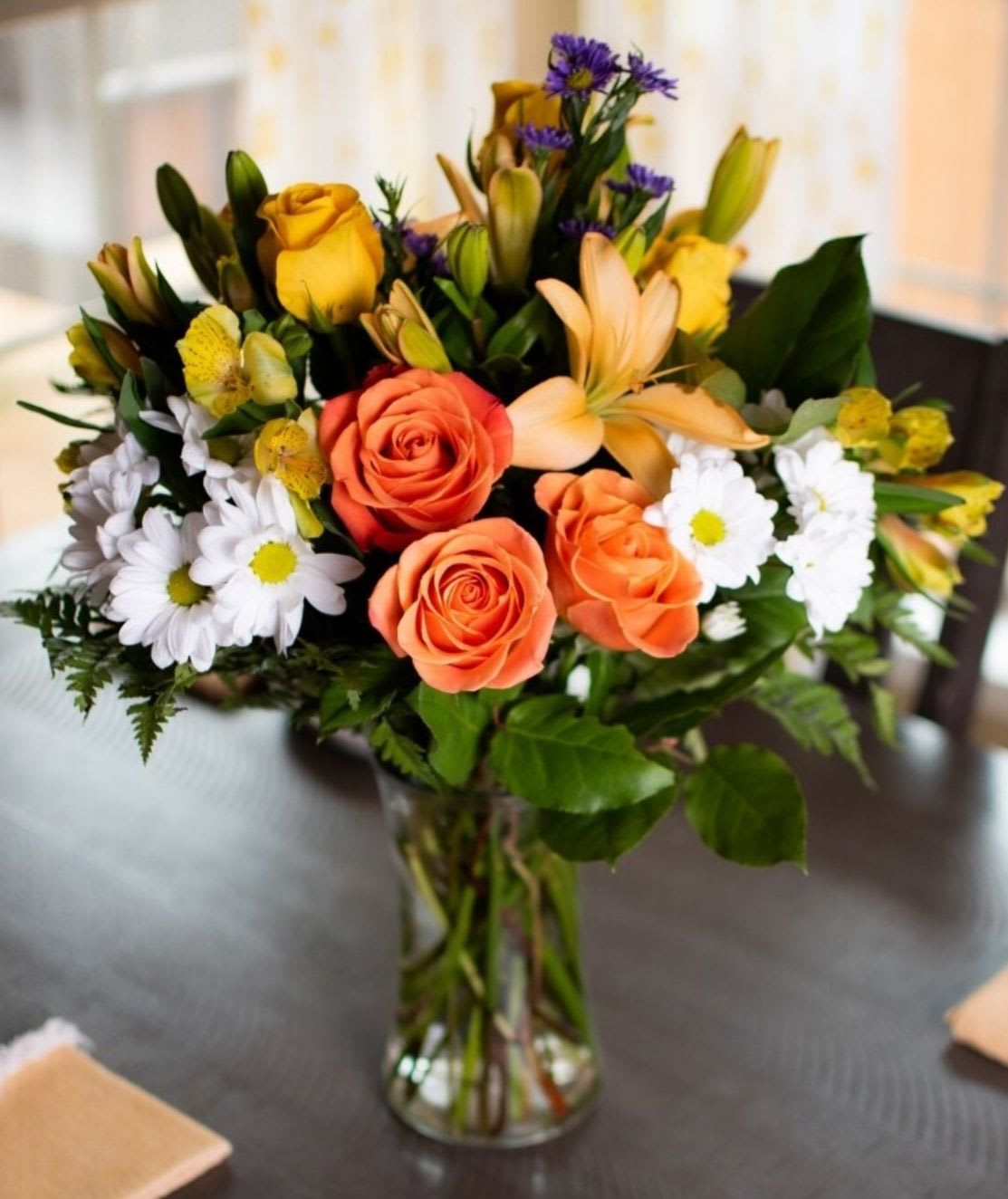 Pretty Pick-Me-Up - Pretty Pick-Me-Up is a cheerful burst of fresh blooms designed to brighten the day and boost the mood. A playful mix of seasonal flowers, soft textures, and happy colors come together to create an arrangement that feels like instant sunshine in a vase.  Perfect for sending encouragement, celebrating small wins, or simply reminding someone they’re loved, Pretty Pick-Me-Up delivers a dose of floral happiness when it’s needed most.