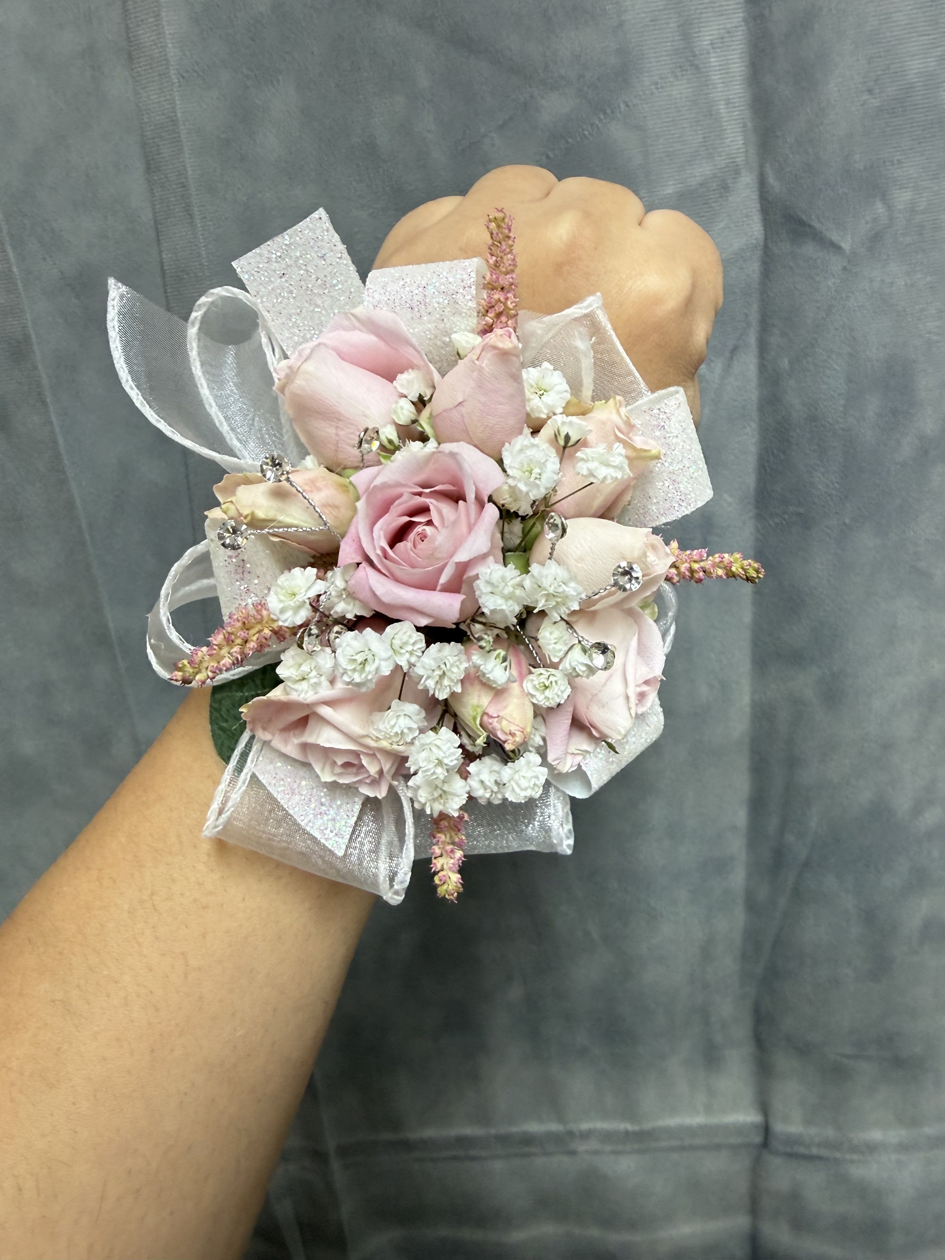 Pink spray roses wrist corsage - pink spray roses with pink and white filler, sheer ribbons and rhinestone sparkle-delicate pearl wrist corsage perfect for prom