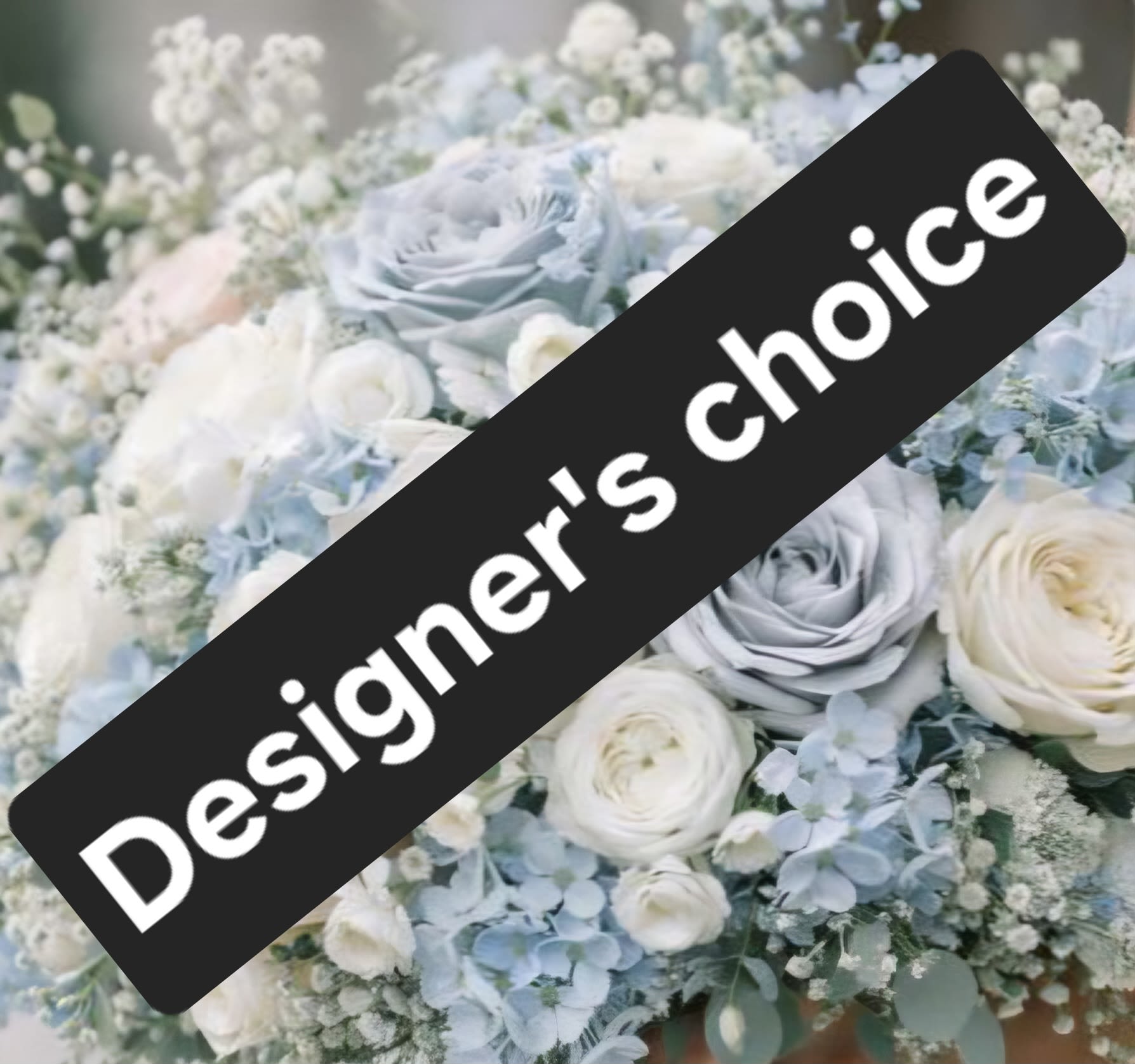 Designer's Choice - Peace - An exclusive one-of-a-kind composition crafted at the designer's descretion, showcasing the finest seasonal blooms in a refined, artictic expression.